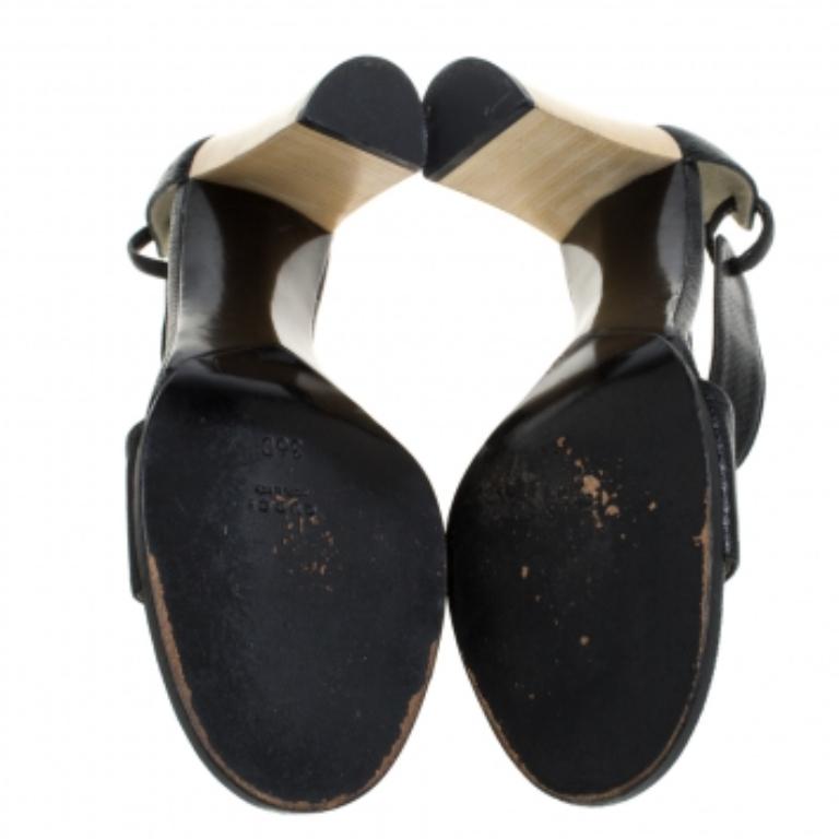 These vintage sandals by Gucci are the epitome of elegance and poise. Crafted from exotic snakeskin, they have open toes and elevated on 8.5 cm heels. These stunning sandals flaunt single vamps straps and come equipped with broad ankle straps and