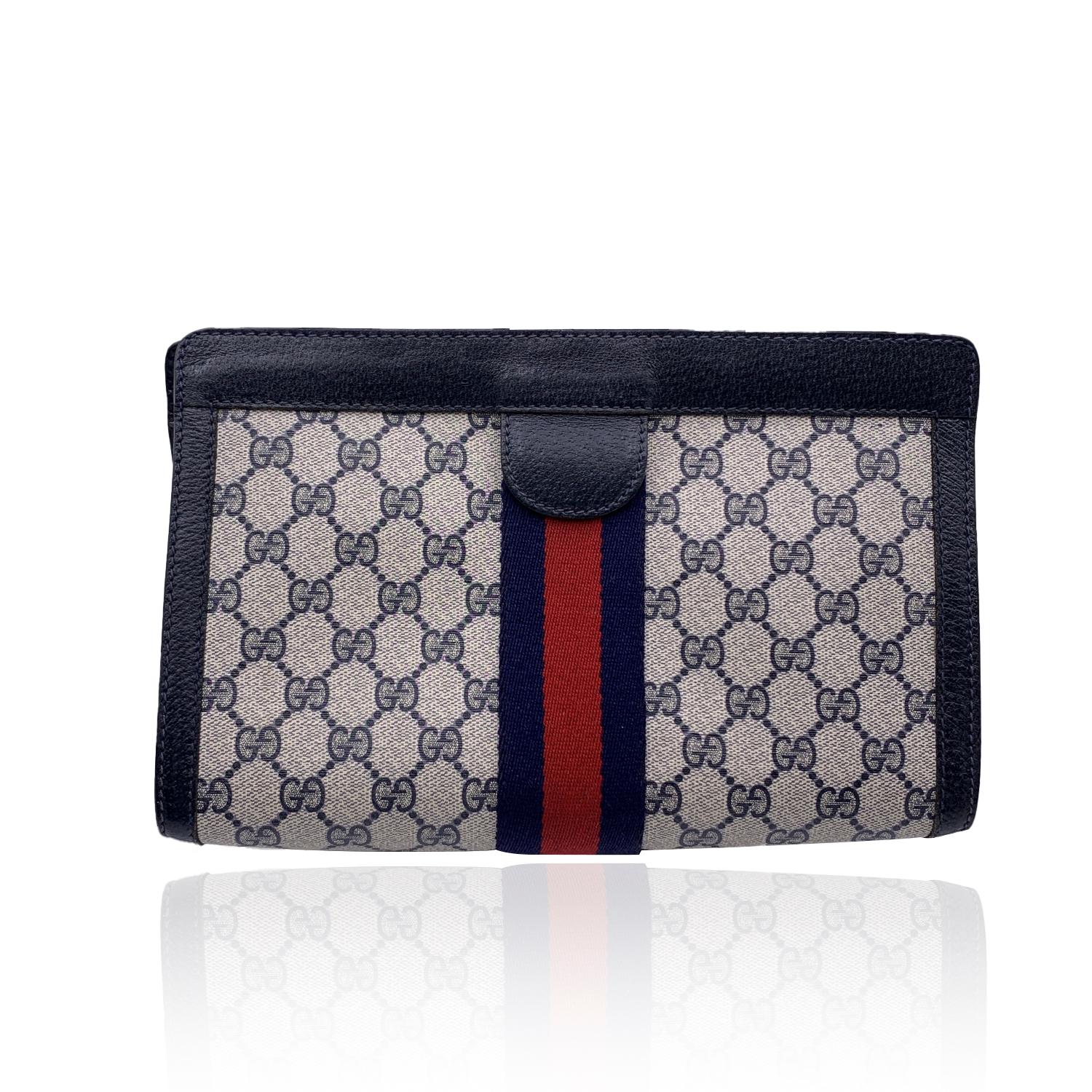 Gucci Vintage Blue Monogram Canvas Cosmetic Bag Clutch with Box In Excellent Condition In Rome, Rome