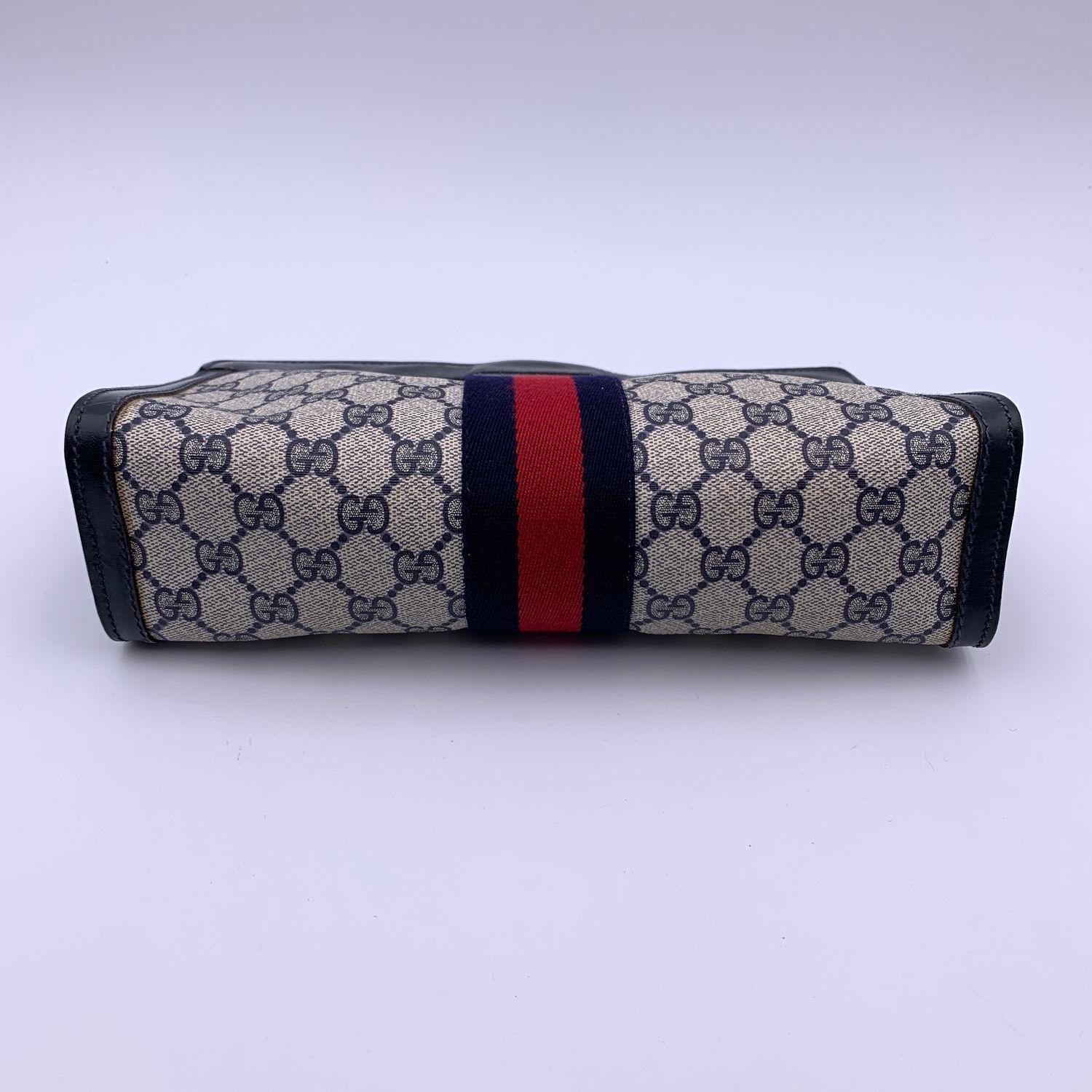 Gucci Vintage Blau Monogramm Canvas Kosmetiktasche Clutch mit Streifen Damen