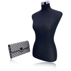 Gucci, borsa vintage in tela Monogram blu con patta e pochette