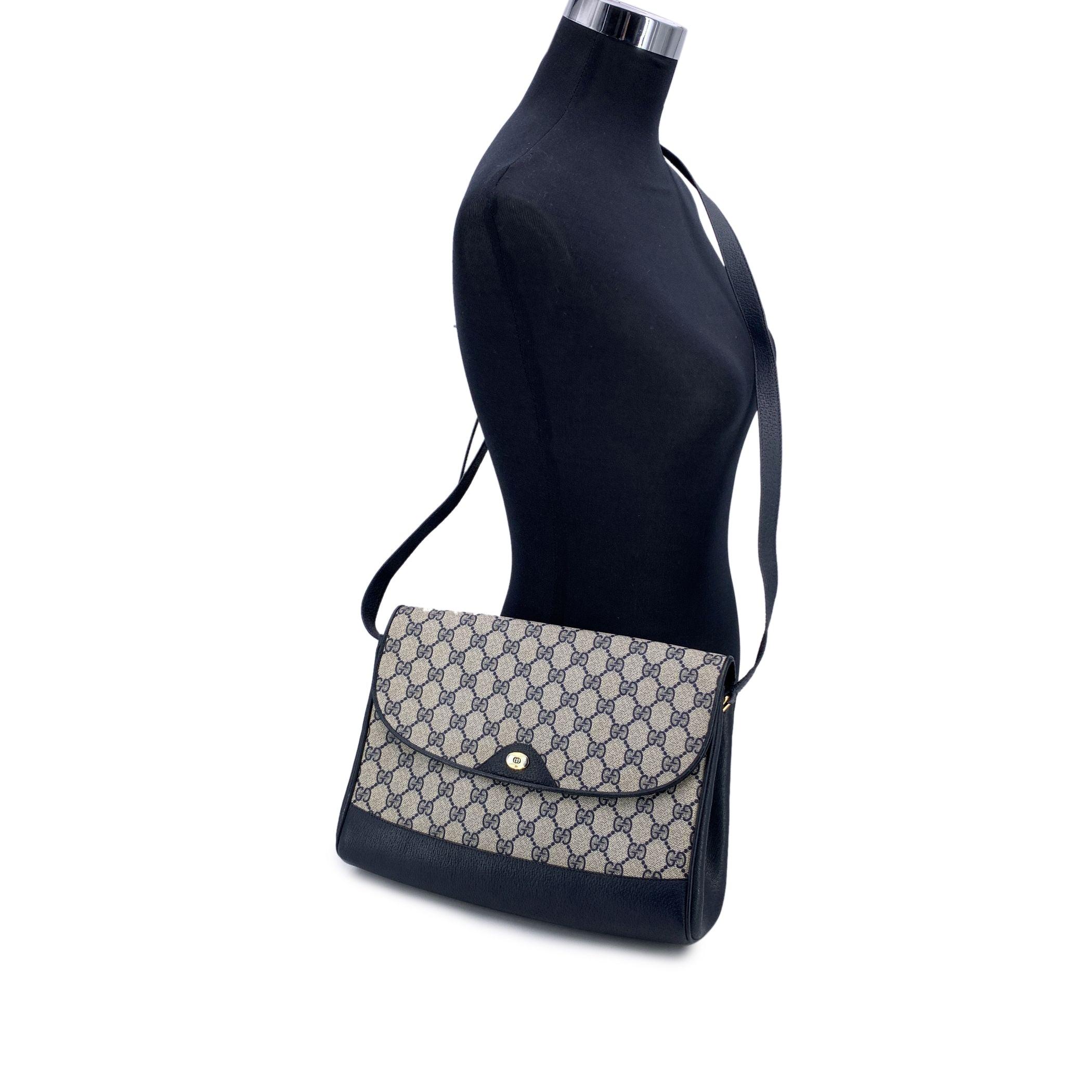 Step back in time with the Gucci Vintage Shoulder Bag, a timeless piece that effortlessly blends classic luxury with everyday practicality. Crafted from Gucci's iconic monogram canvas, this bag is beautifully trimmed with rich blue genuine leather,