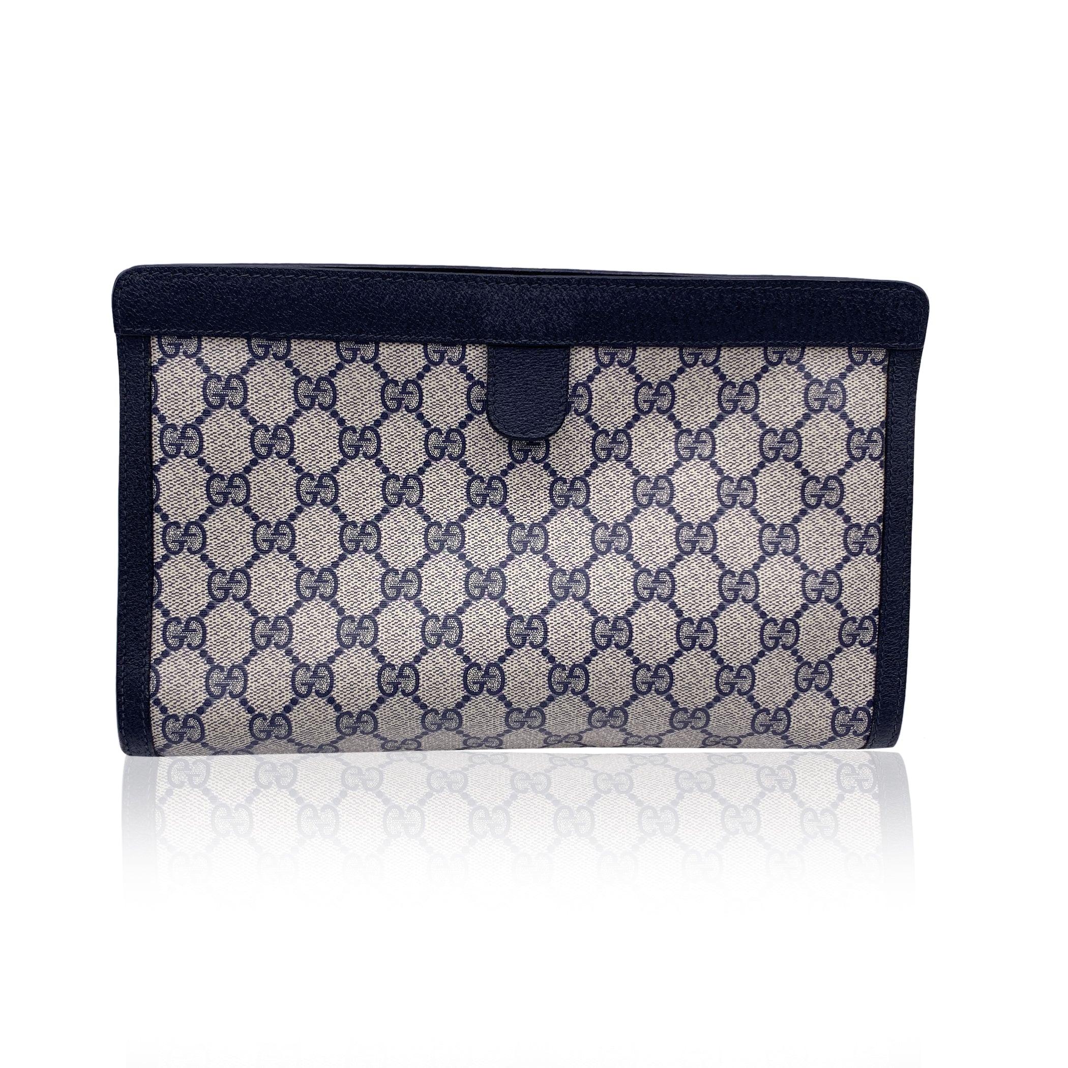 Gucci Vintage Blue Monogram Canvas Web Cosmetic Bag Clutch In Good Condition In Rome, Rome