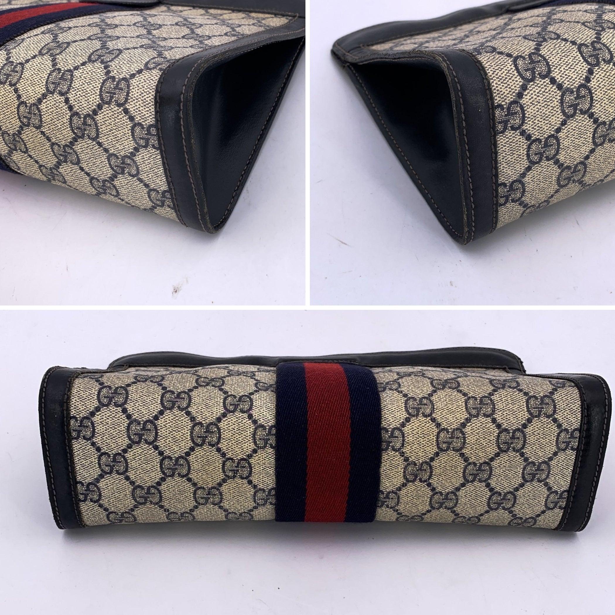 Bolso cosmético monograma azul vintage de Gucci Embrague grande con rayas en venta 1