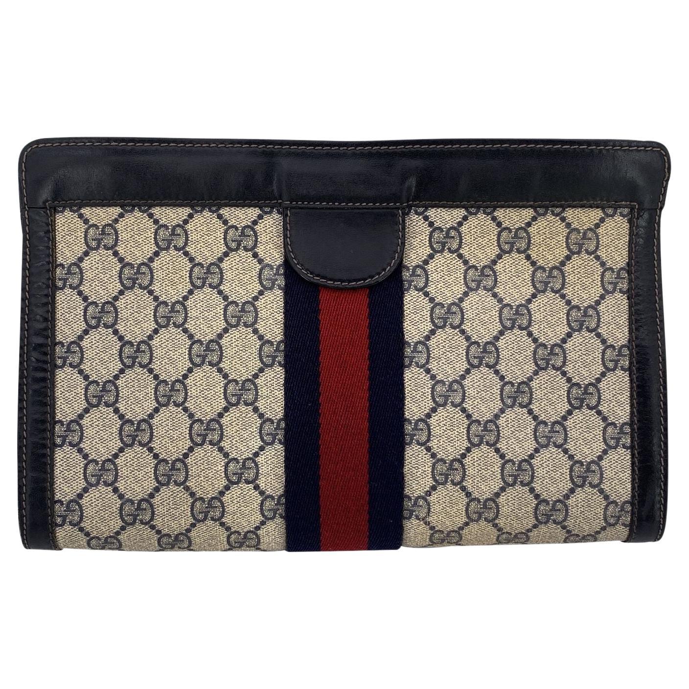 Bolso cosmético monograma azul vintage de Gucci Embrague grande con rayas en venta