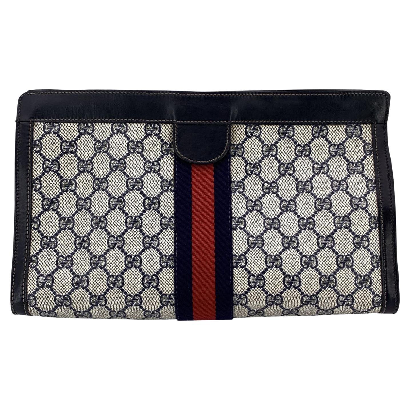 Bolso cosmético monograma azul vintage de Gucci Embrague grande con rayas