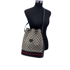 Gucci Vintage Blue Monogram Drawstring Bucket Bag with Stripes