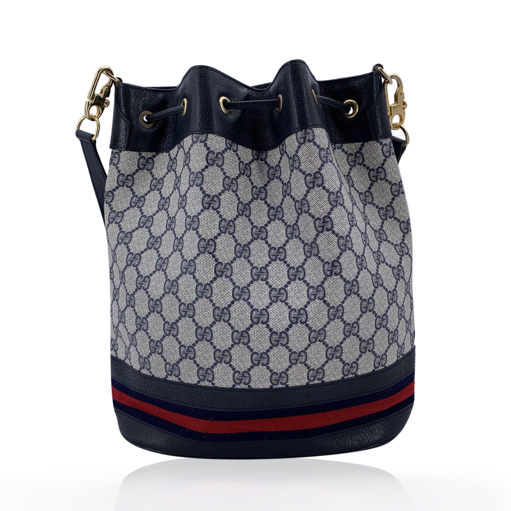 Black Gucci Vintage Blue Monogram Drawstring Bucket Bag with Stripes