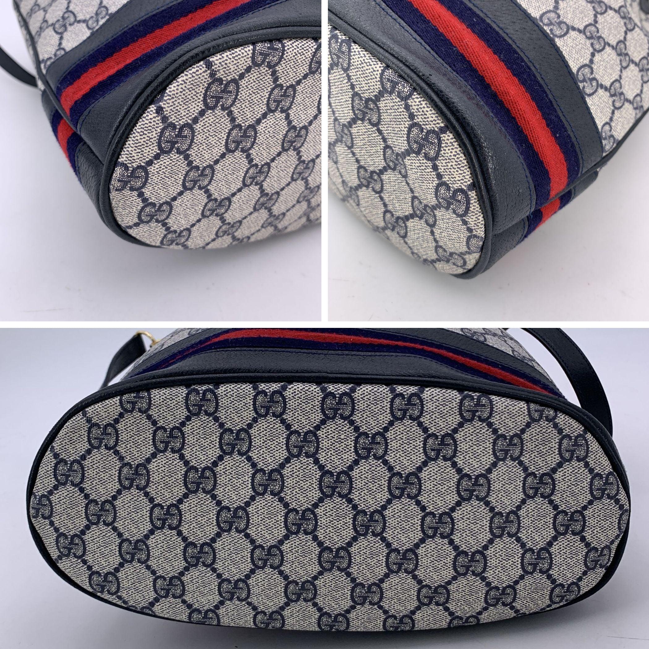 Gucci Vintage Blue Monogram Drawstring Bucket Bag with Stripes In Good Condition In Rome, Rome