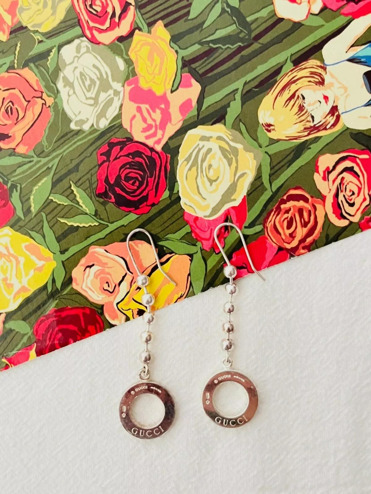 Gucci Vintage Unisex Boule Dots Logo Circle Round Hoop Chain Drop Dangle Hook Pierced Earrings, 100% Silver 

Very good condition. Light scratches or colour loss, barely noticeable. 100% Genuine.

Size: 5.5*1.6 cm.

Weight: 5 g/each.

_ _ _

Great