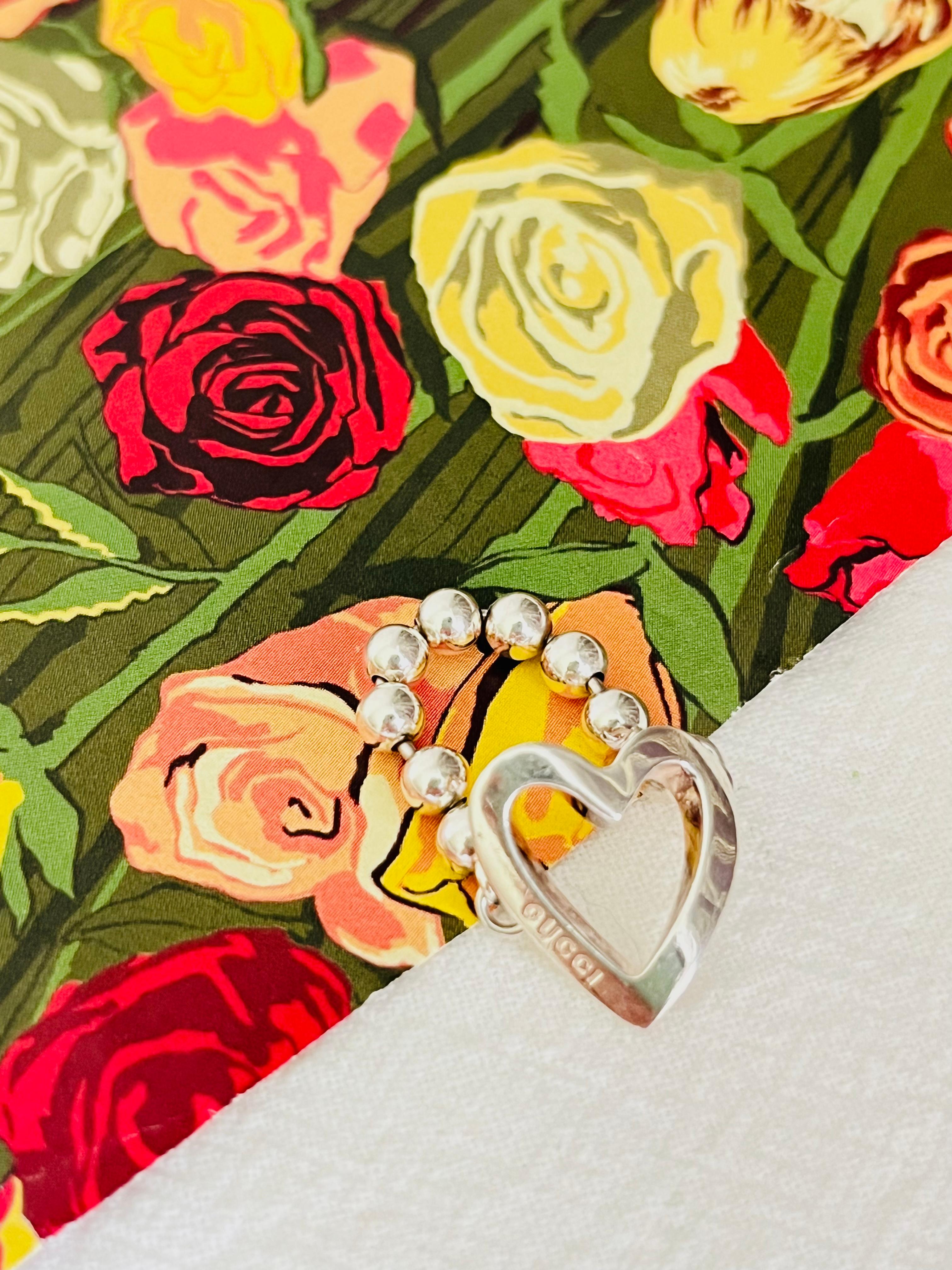 Gucci Vintage Unisex Boule Logo Heart Love Ball Dots Cadena Anillo Plata de Ley, US 7

Muy buen estado. Alguna pérdida de color en el interior, apenas perceptible. 

Raro de encontrar. Vintage. 100% original.

Talla UK: O.

_ _ _

Genial para llevar