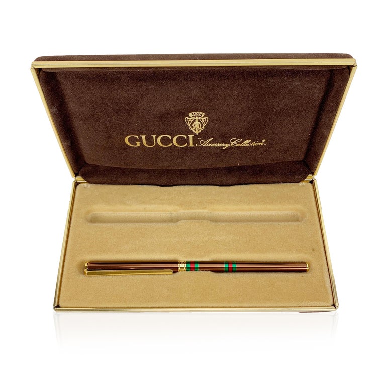 Gucci GG Black Lacquer Gold Tone Ballpoint Pen Gucci