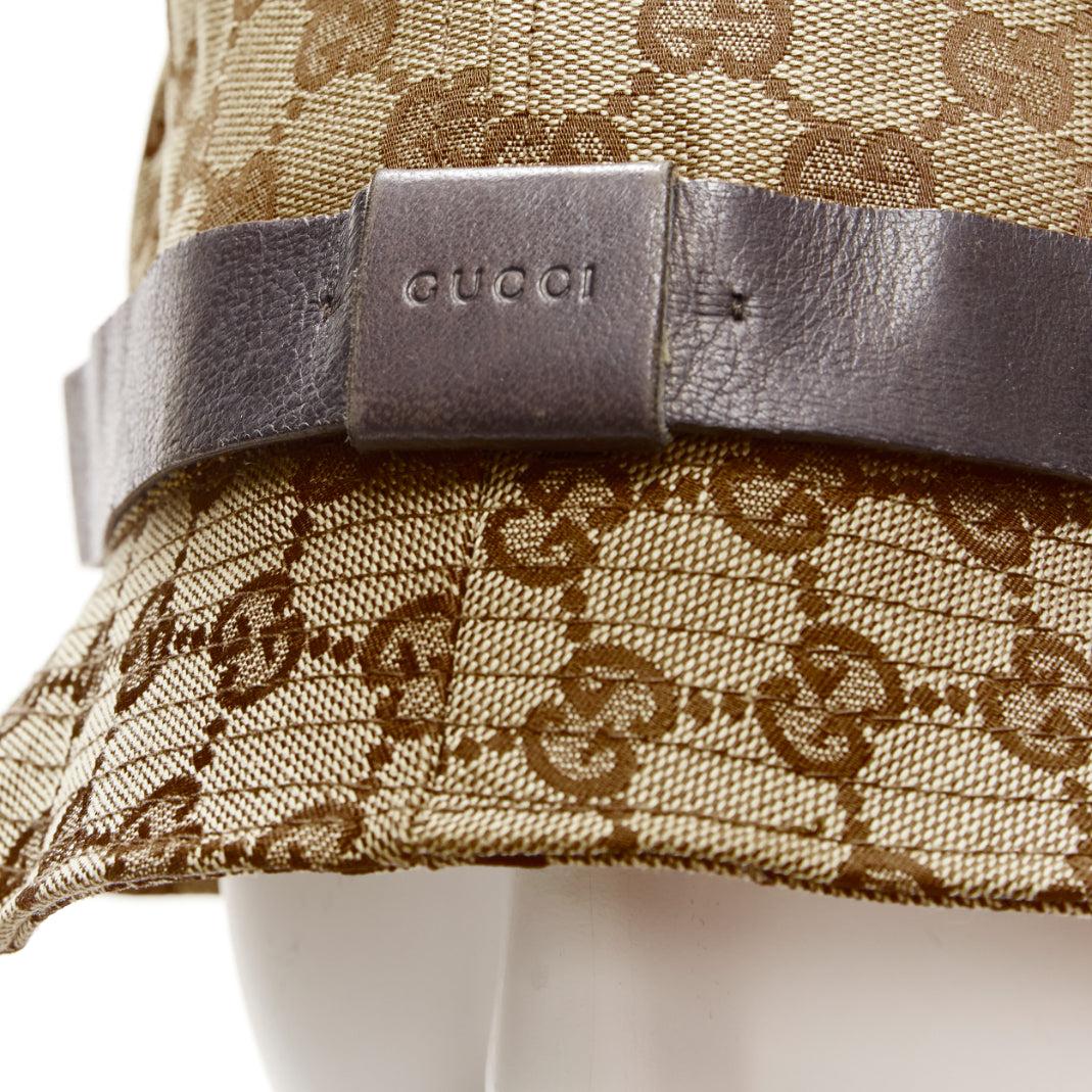 GUCCI Vintage brown GG monogram leather trim bucket hat L
Reference: KNCN/A00035
Brand: Gucci
Material: Fabric, Leather
Color: Beige, Brown
Pattern: Monogram
Lining: Brown Fabric
Made in: Italy

CONDITION:
Condition: Very good, this item was