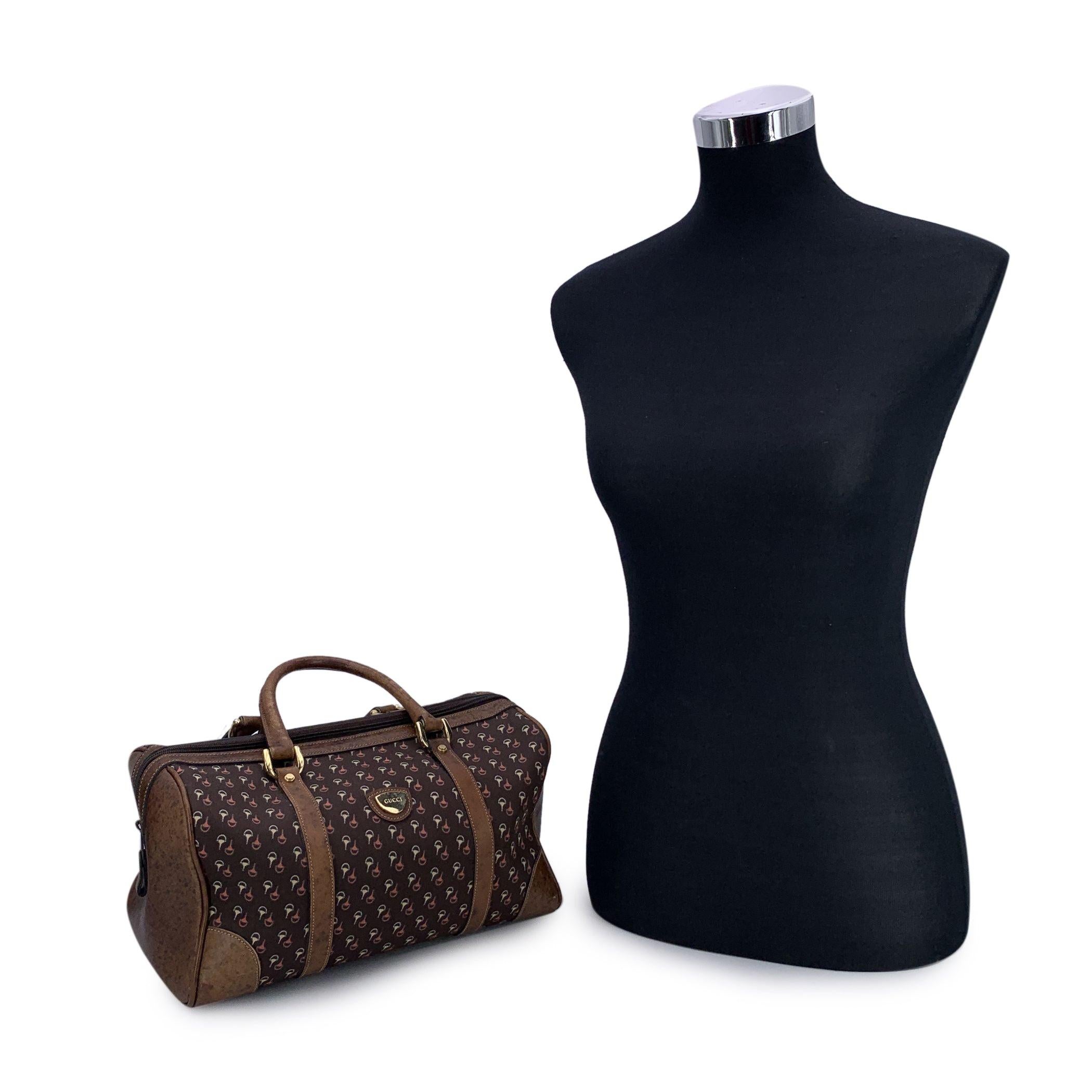 Step into timeless sophistication with this rare vintage Gucci Boston Bag, a true emblem of classic luxury from the Italian house's golden era. Crafted in Gucci's signature brown horsebit print canvas, this iconic model captures the refined spirit