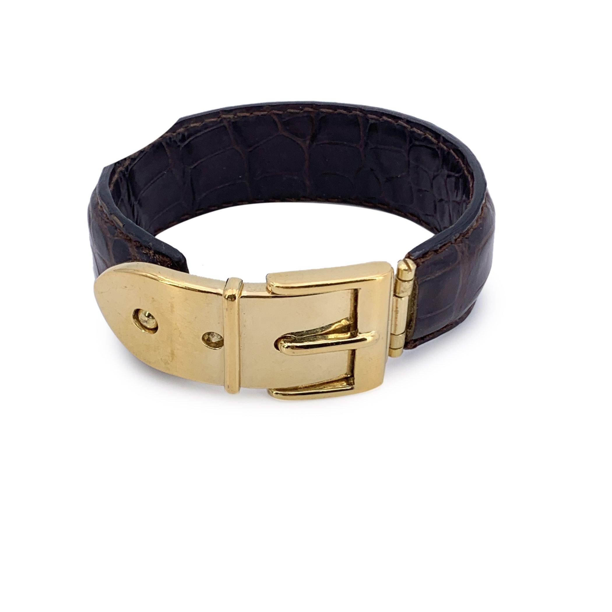 Vintage beautiful cuff bracelet by Gucci. Made in brown leather, it features an gold metal buckle. Will fit up to approx. 6.5 inches - 16.5 cm wrist.Width: 0.75 inches - 2 cm. 'Gucci - made in Italy' engraved on the reverse of the hardware.