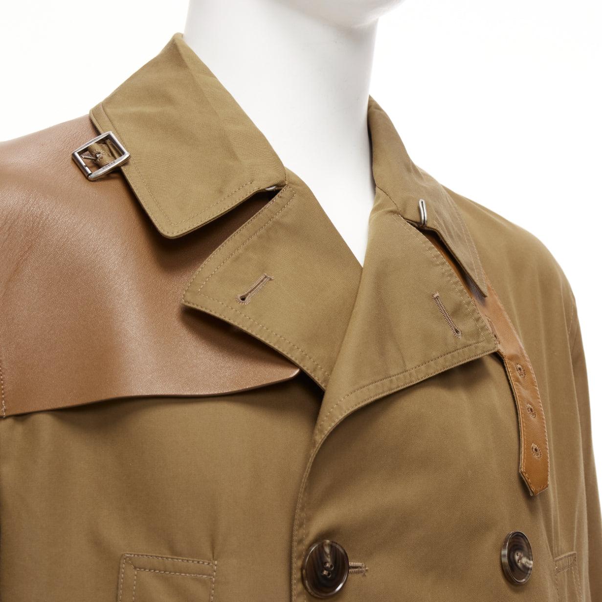 GUCCI Vintage brown leather trimmed cotton wool blend lined trench coat IT48 M
Reference: JSLE/A00101
Brand: Gucci
Material: Leather, Cotton, Blend
Color: Brown
Pattern: Solid
Closure: Button
Lining: Grey Fabric
Extra Details: Brown leather trimmed.