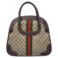 Gucci borsa a cartella vintage in tela Monogram marrone con strisce