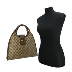 Gucci Vintage Brown Monogram Canvas Stirrup Hobo Bag Handbag