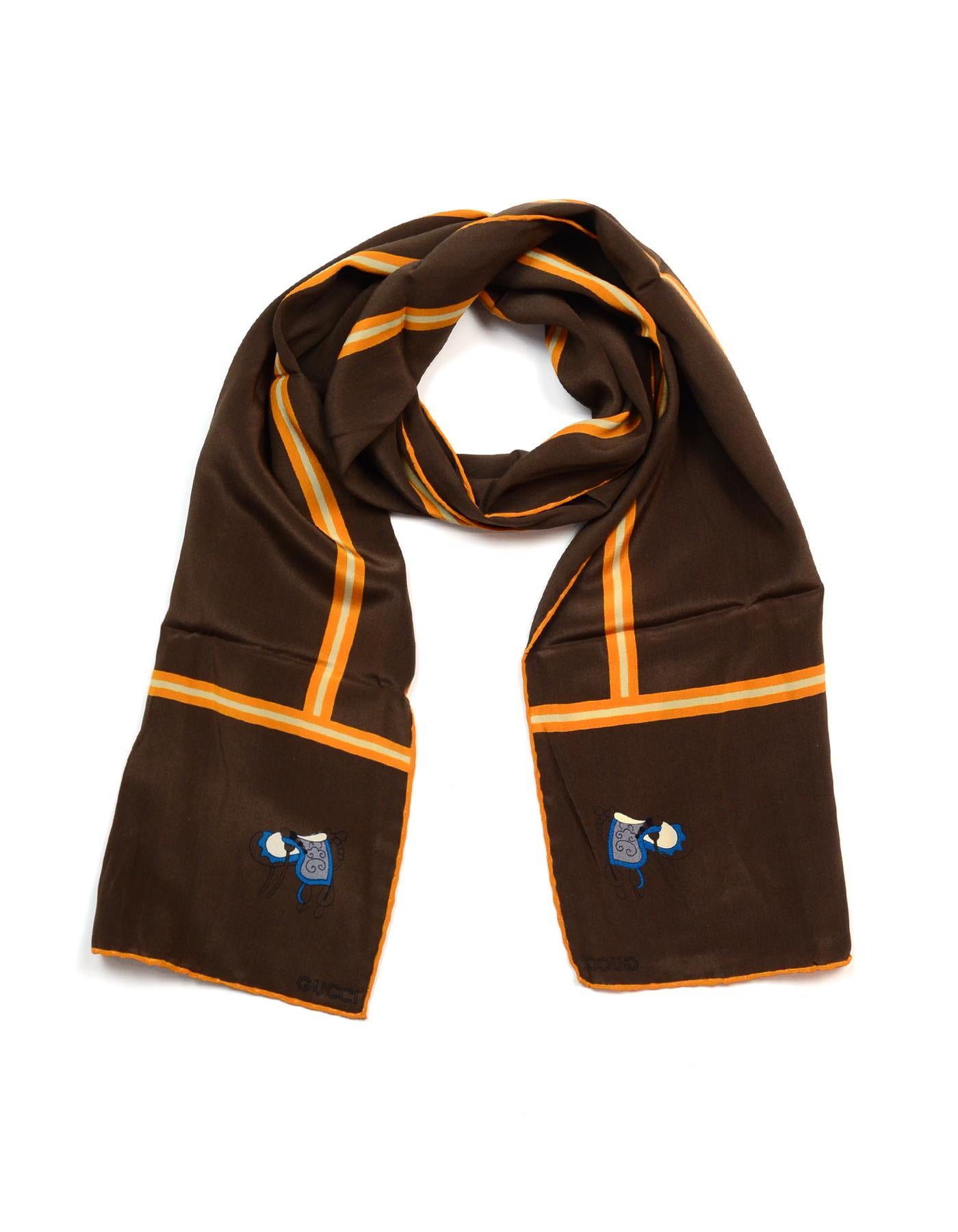 Gucci Vintage Brown/Orange Silk Long Scarf W/ Sleeve

Color: Brown/orange
Materials: Silk (no composition tag)
Overall Condition: Excellent vintage, pre-owned condition
Includes: Gucci cardboard sleeve 

Measurements: 
60