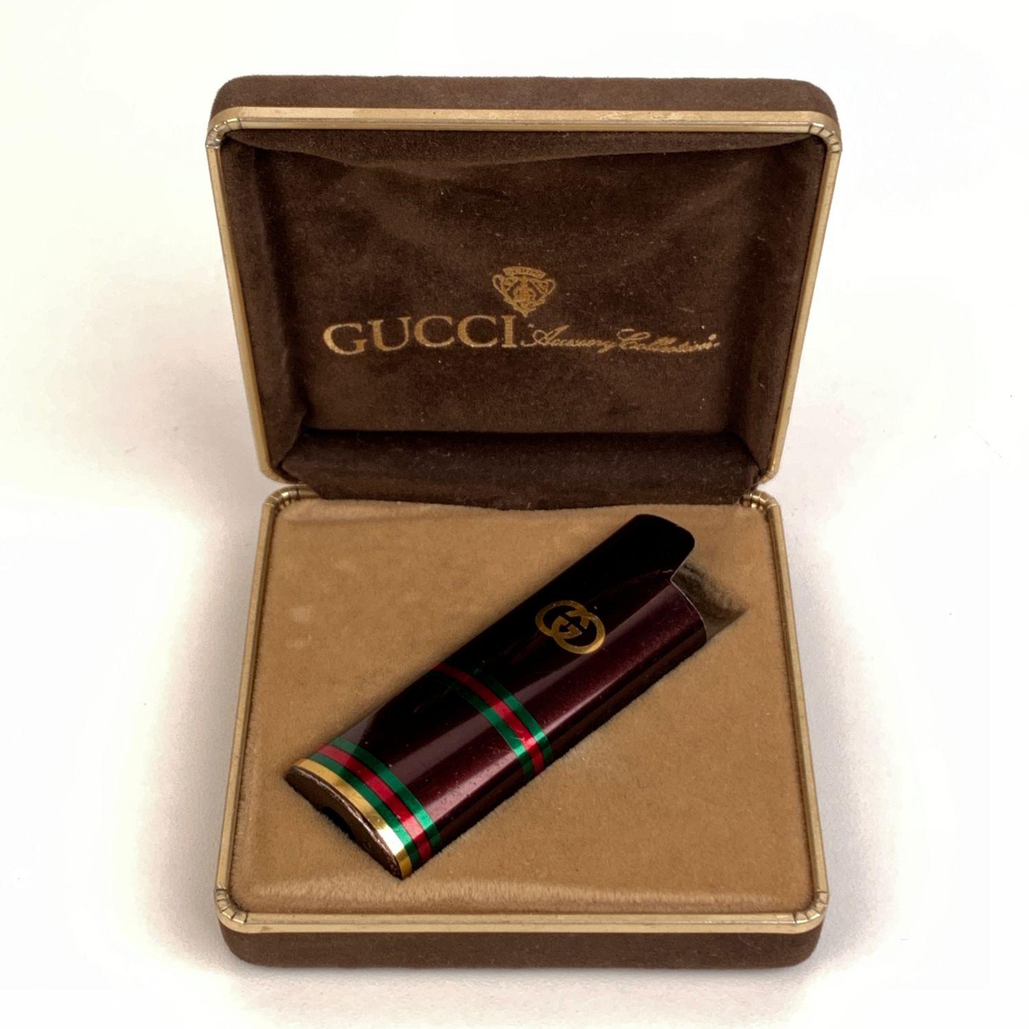 Gucci Vintage Brown Signature Web Disposable Lighter Case Cover For Sale at  1stDibs | gucci lighter case, vintage gucci lighter, gucci loghter