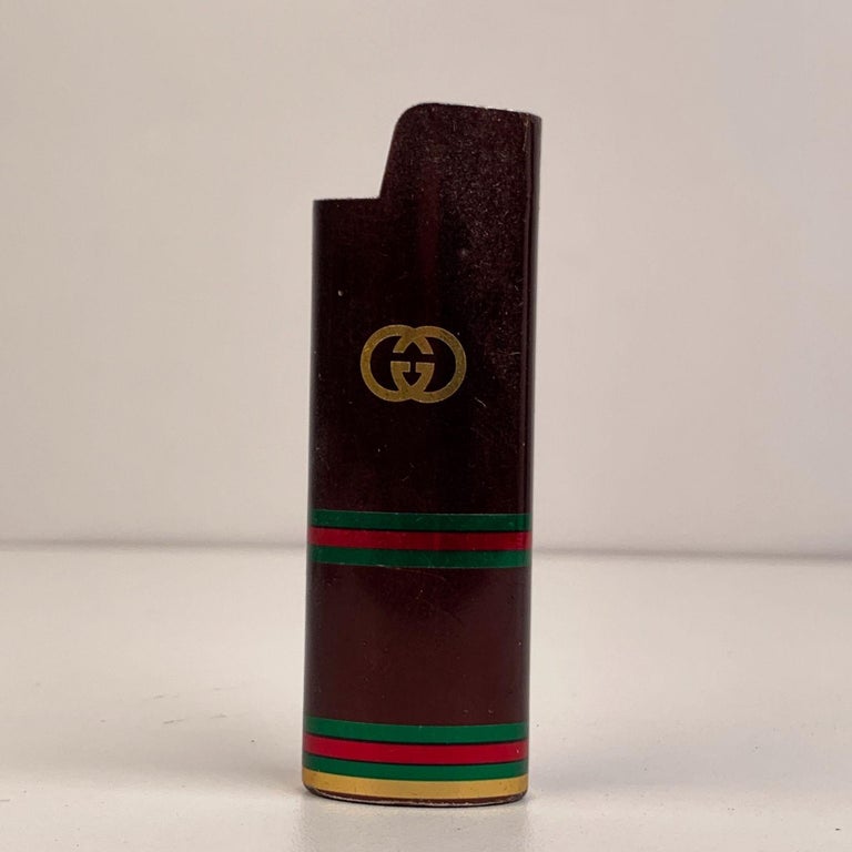 Gucci Vintage Brown Signature Web Disposable Lighter Case Cover For Sale at  1stDibs | gucci lighter case, gucci lighter holder, vintage gucci lighter