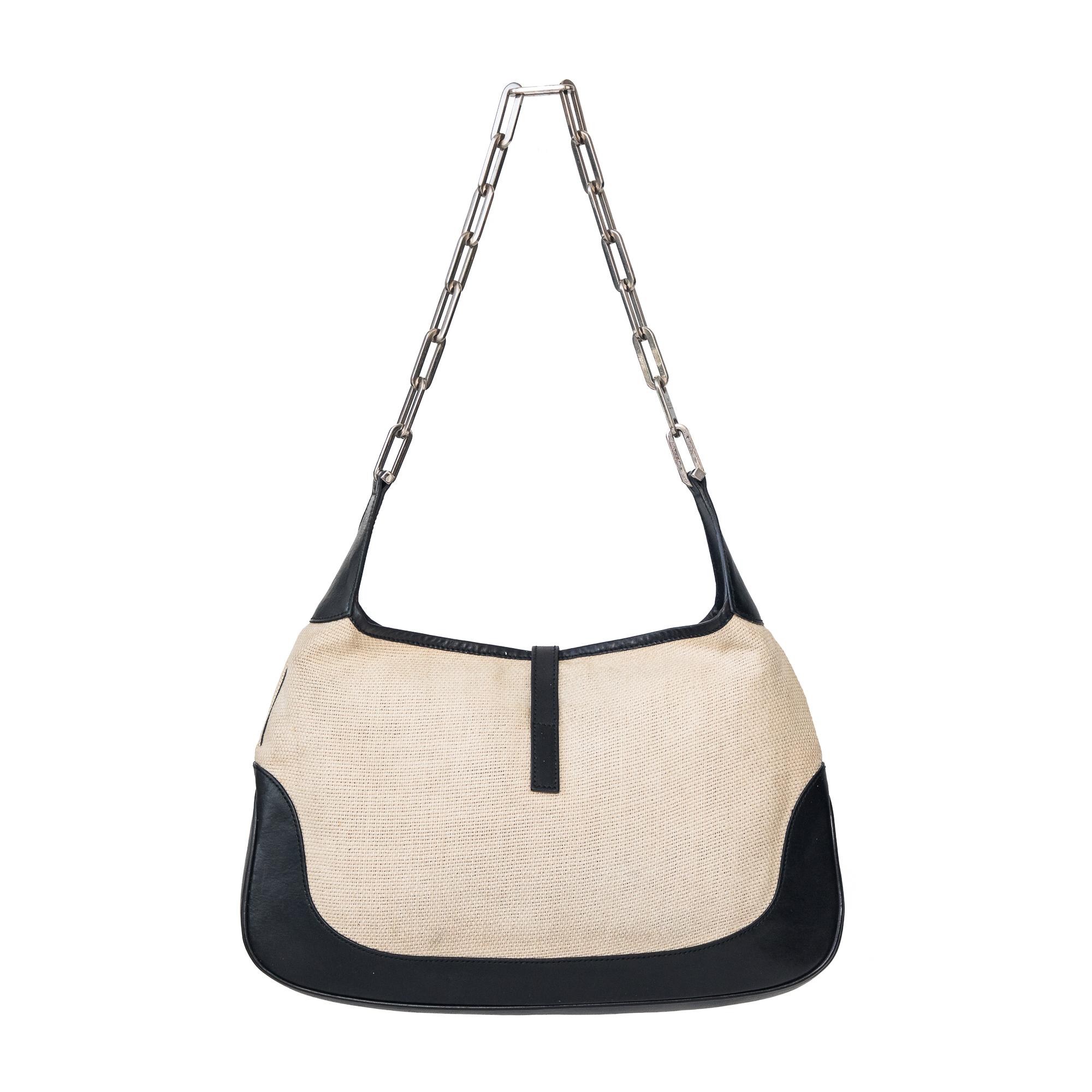 Ruder Than The Rest presents a rare vintage Gucci Jackie handbag with chain handle  from the spring-summer 2000 collection.

A very unique version of the jackie handbag, one that uses a link chain handle instead of the typical leather. The handle