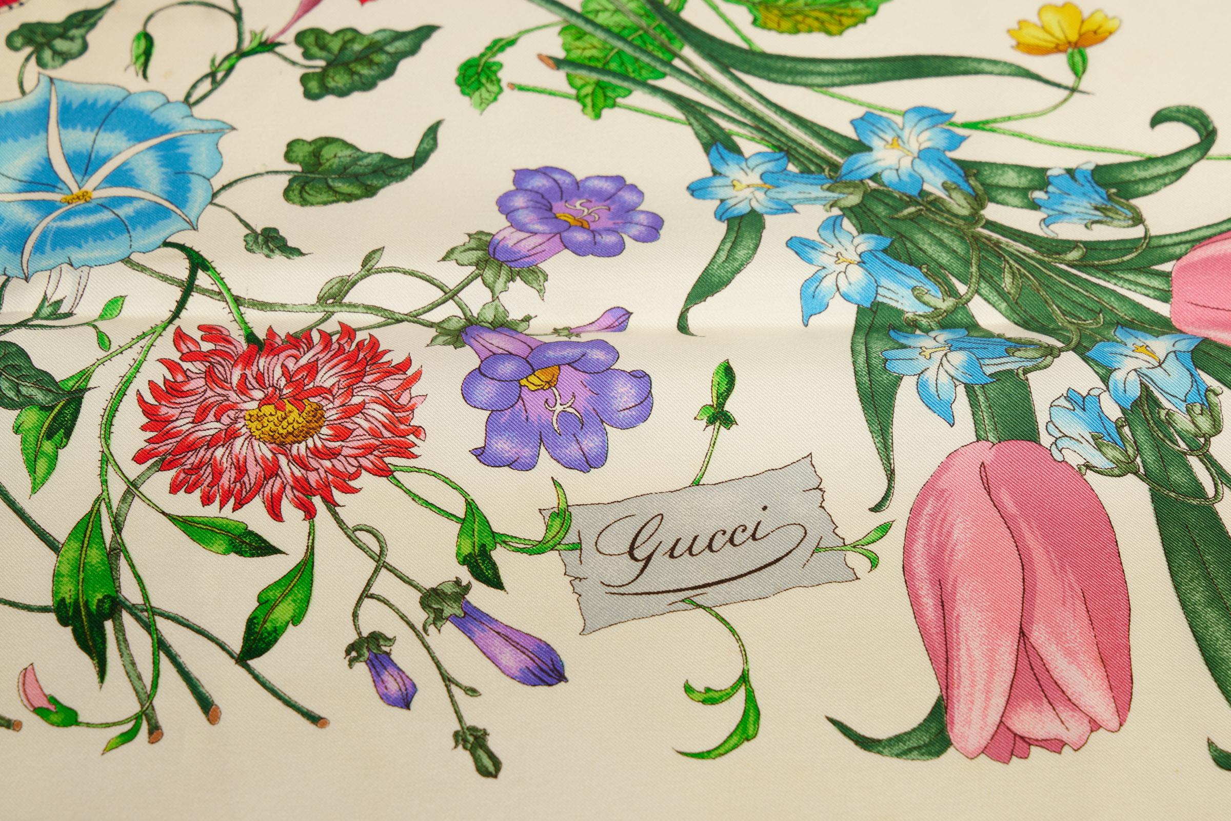 Gucci collectible Accornero 1973 silk flower scarf. One minor stain, we did not try to clean it. Hand rolled edges. Original care tag.
