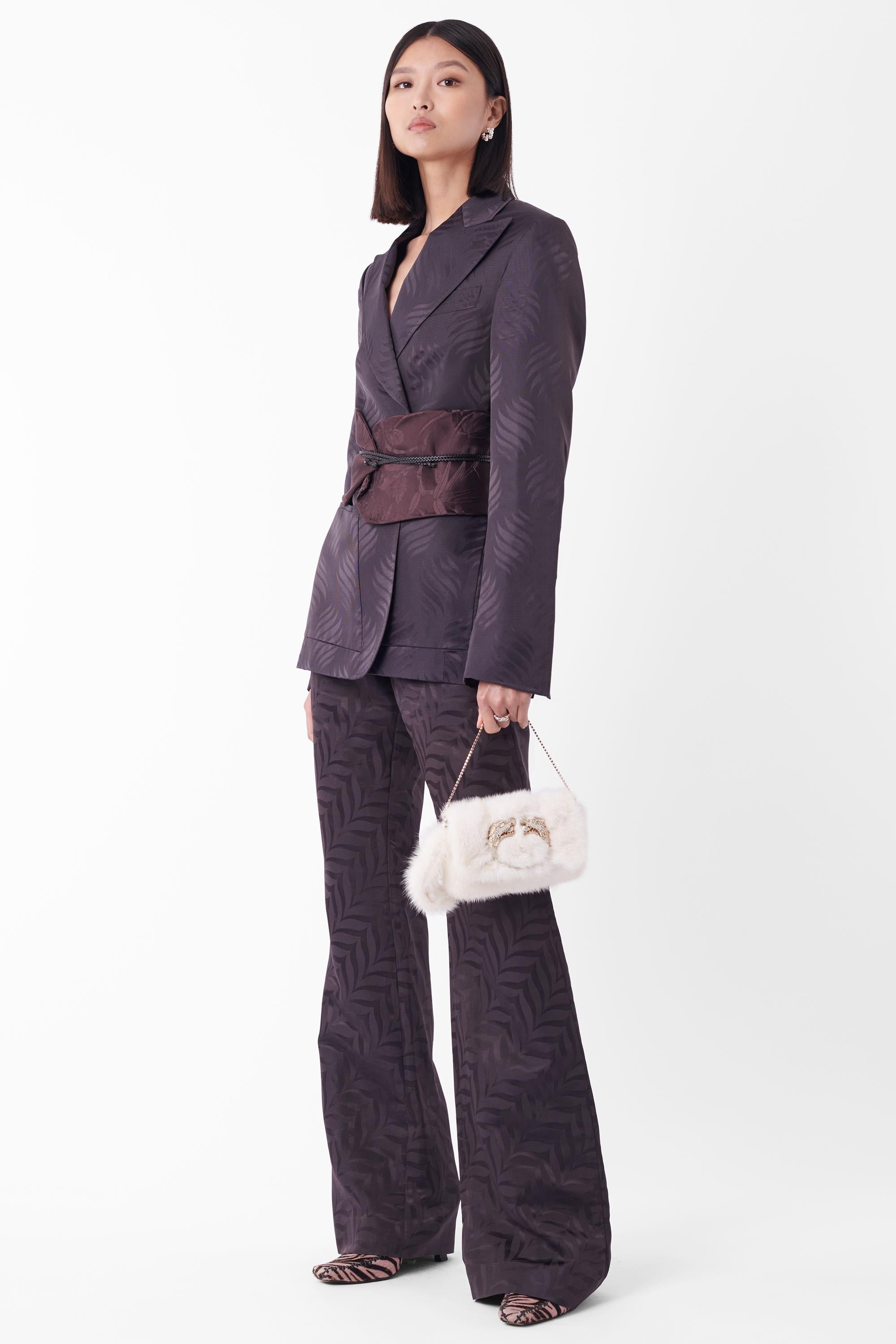 We are excited to present this Tom Ford for Gucci iconic Fall Winter 2002 kimono runway obi belt set. Features embossed print over the entire co-ord, with two front pockets on the blazer and two invisible hip pockets on the trousers, invisible zip