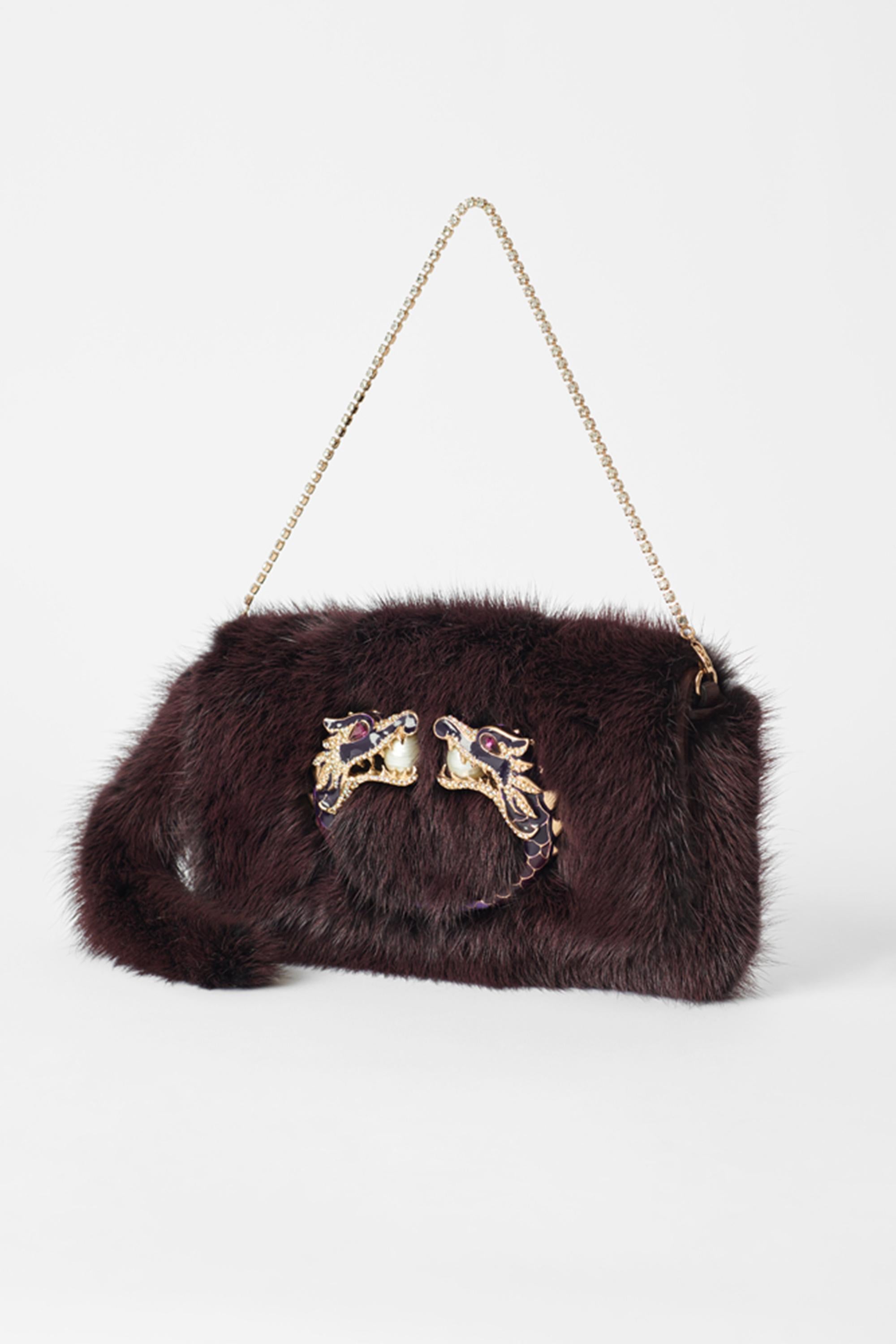 Gucci by Tom Ford Fall Winter 2004 mink fur bag, as seen on the runway. Features mink fur body, detachable crystal chain, embellished gold dragon with pearl centre on front and magnetic closure. In excellent vintage condition, comes with