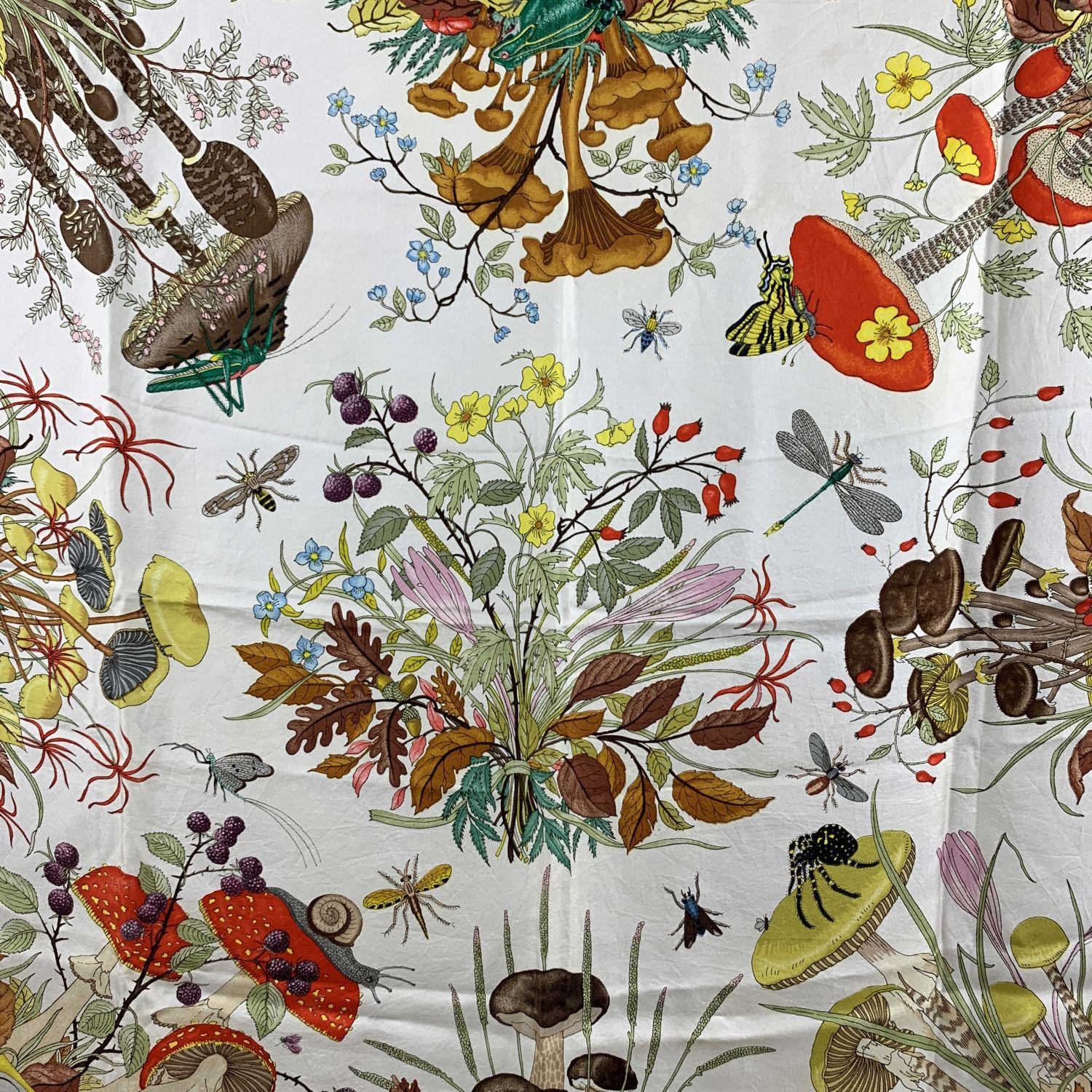 Gucci Vintage Floral 'Funghi' (Mushrooms) silk scarf. Designed by Vittorio Accornero for GUCCI in 1967. Multicolor flowers and mushrooms design. White borders and background. 100% Silk. Printed GUCCI signature, 'V.Accornero' signature printed on the