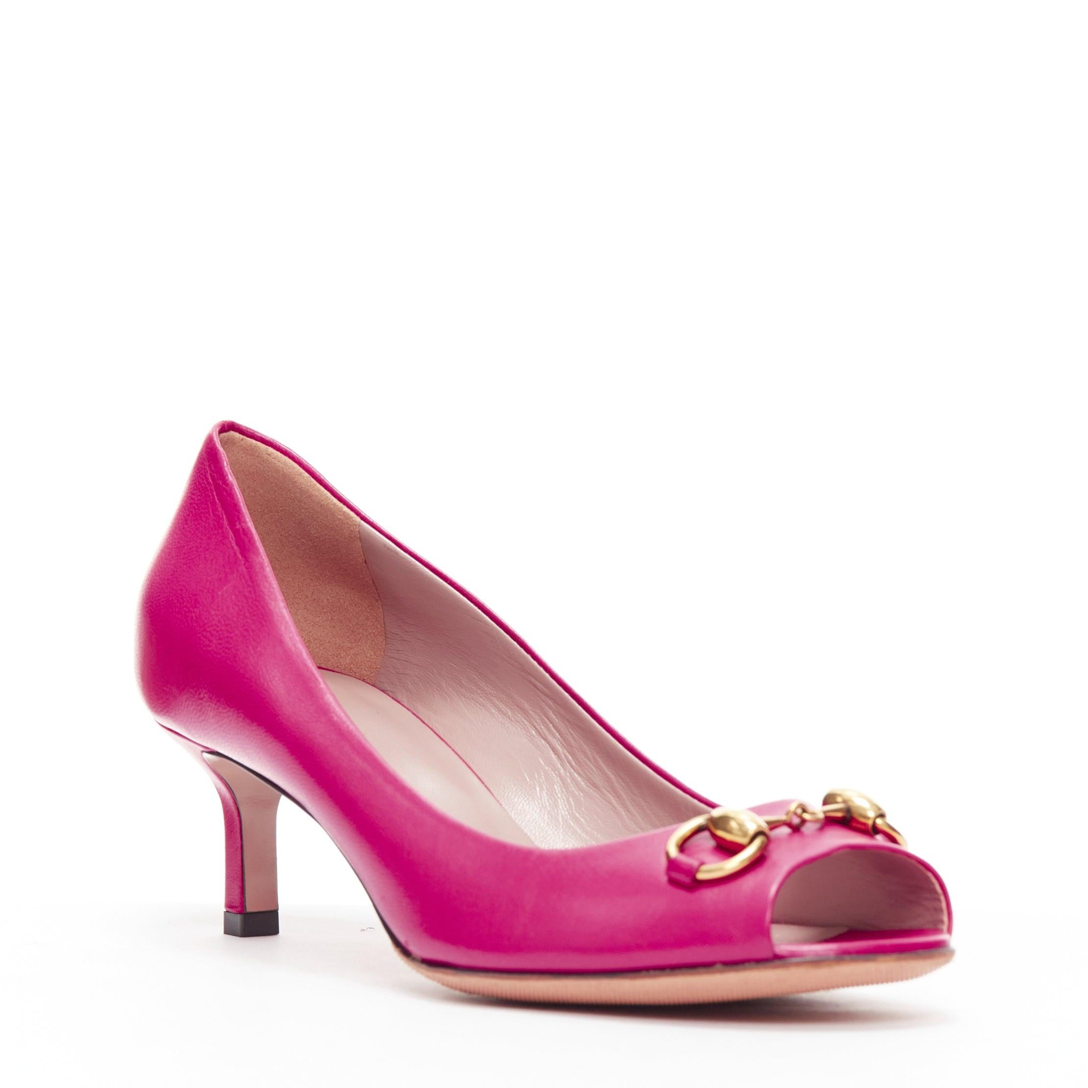 GUCCI Vintage fuschia pink gold horsebut peep toe kitten heel EU36
Reference: CELG/A00365
Brand: Gucci
Material: Leather, Metal
Color: Pink, Gold
Pattern: Solid
Lining: Purple Leather
Extra Details: Gold-tone horsebit hardware.
Made in: