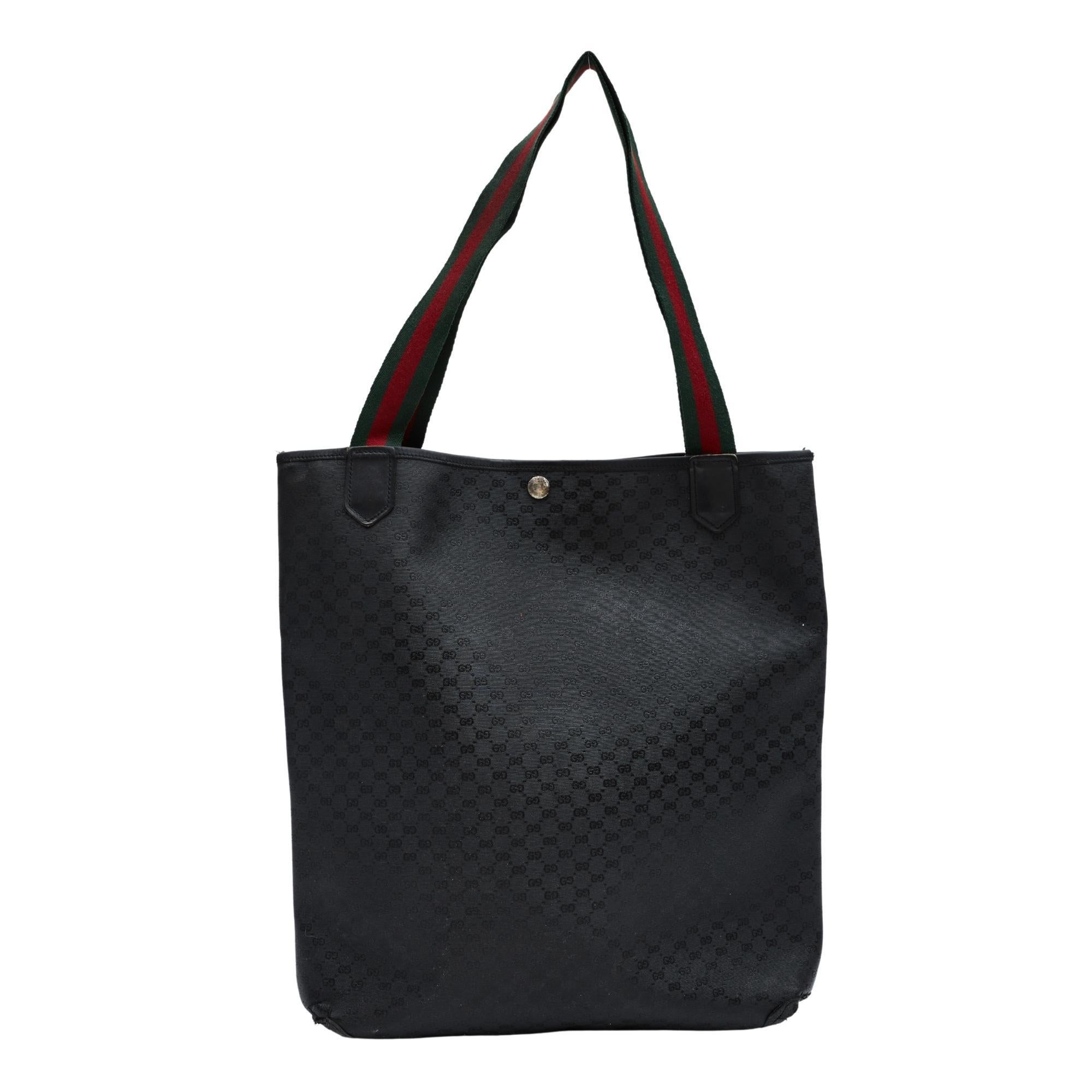 COLOR: Black
MATERIAL: Coated canvas
MEASURES: H 15” x L 15” x D 3.5”
DROP: 10”
CONDITION: Fair - professionally refurbished bag. Small rip at button closure at top has been repaired, marks to interior, exterior has been dyed. The dye rubs off on