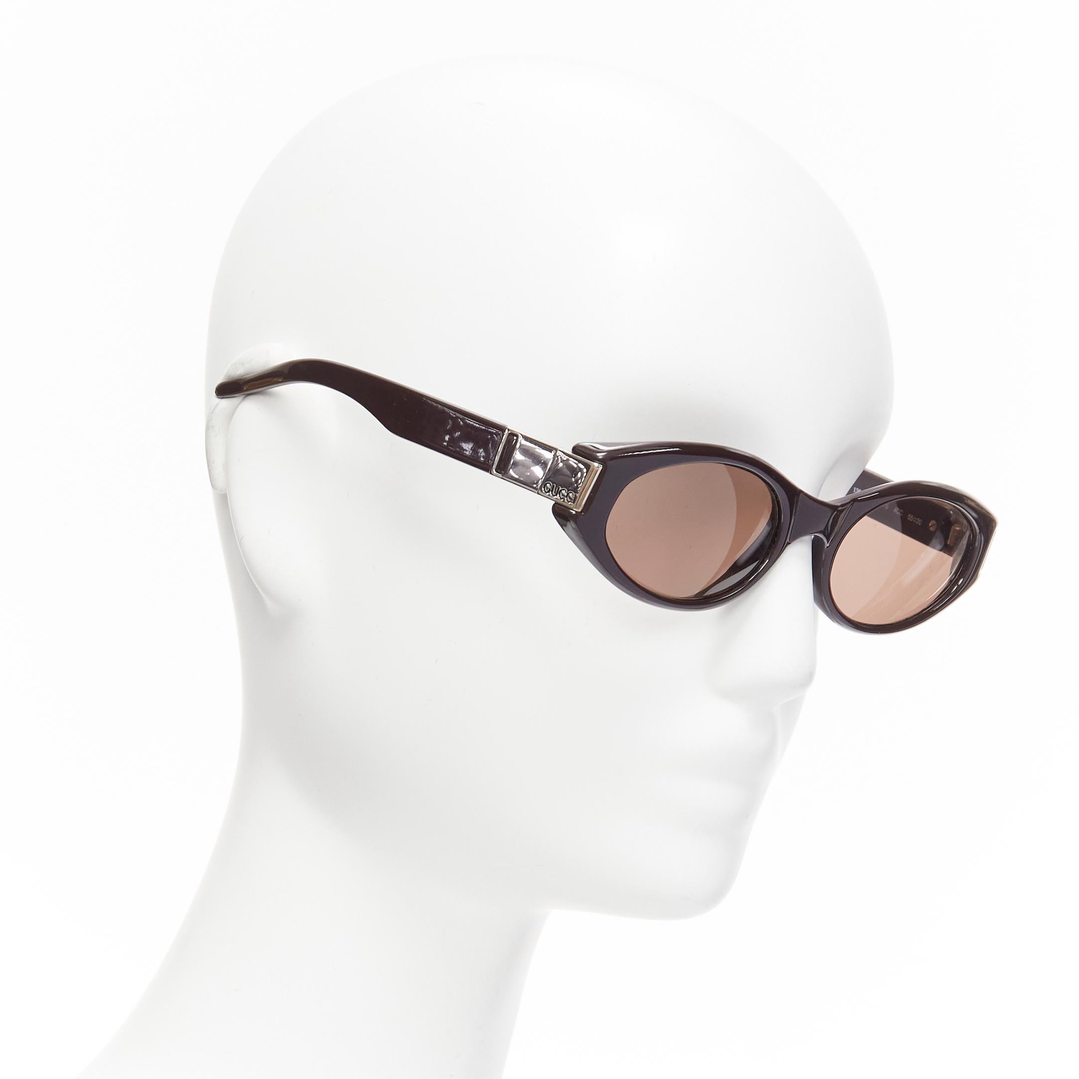 GUCCI Vintage GG2411S dark brown GG logo egg shape retro sunglasses
Reference: WEWN/A00018
Brand: Gucci
Model: GG2411S
Material: Acetate
Color: Brown
Pattern: Solid
Lining: Brown Acetate
Extra Details: Logo at sides.
Made in: