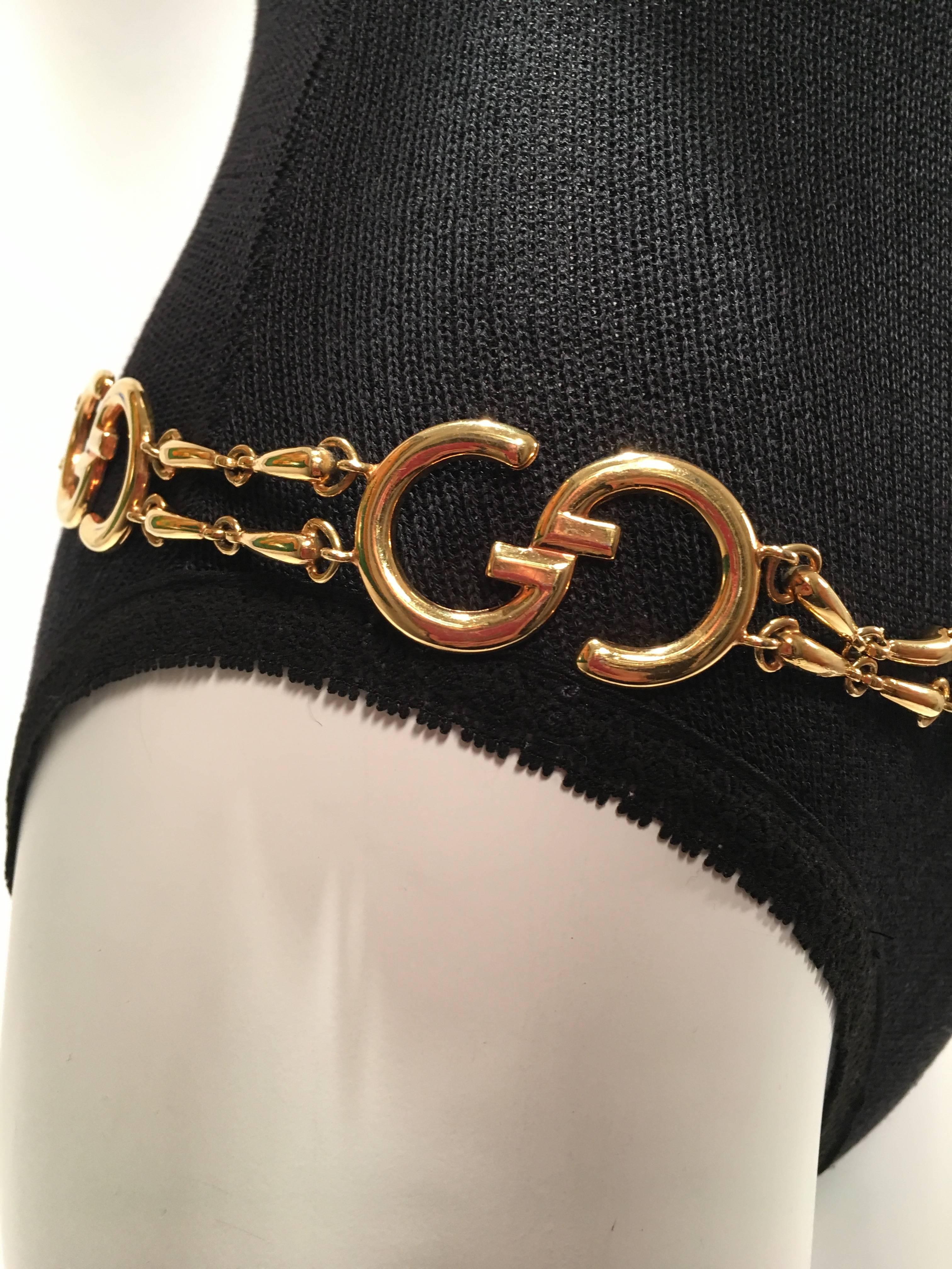 Ceinture Gucci vintage en or avec logo GG et chaîne dorée Unisexe en vente