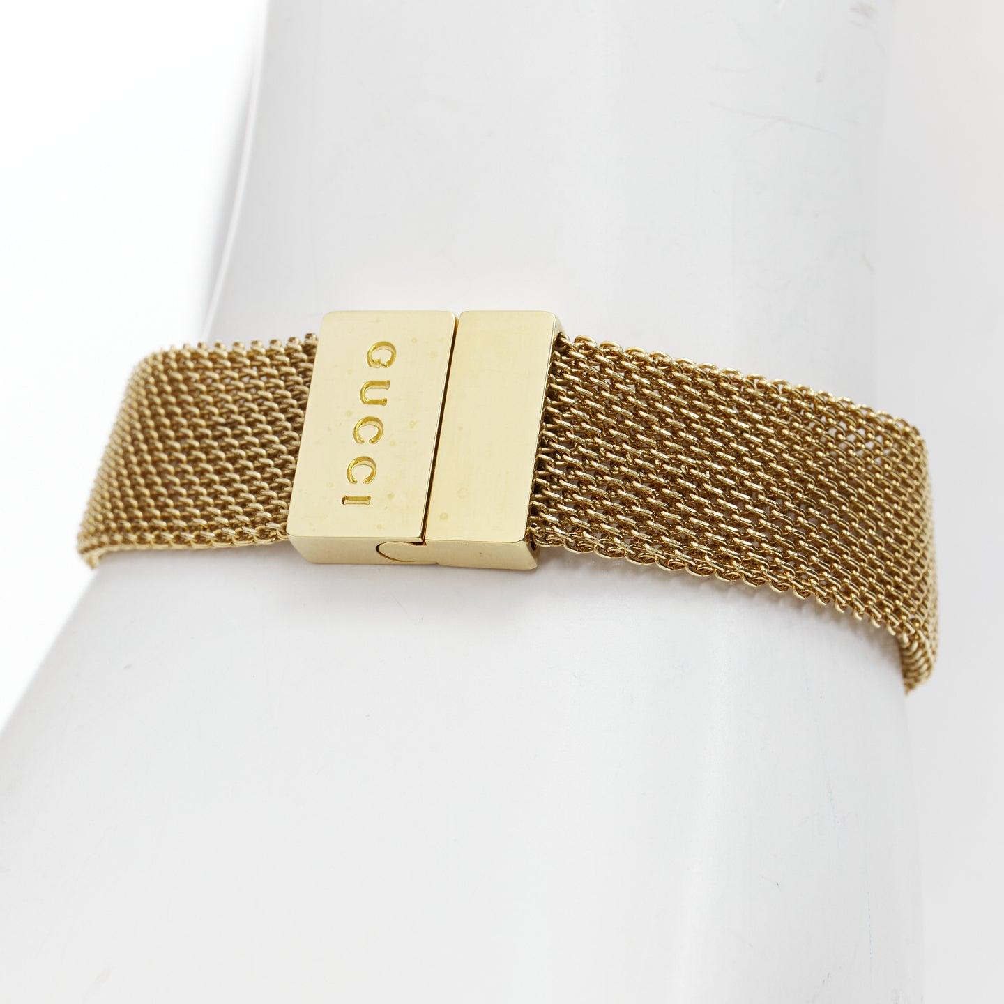 GUCCI Vintage gold plated chainmail logo metal bracelet
Reference: TGAS/E00736
Brand: Gucci
Material: Metal
Color: Gold
Pattern: Solid
Closure: Loop Through
Extra Details: Logo at clasp.
Made in: Italy

CONDITION:
Condition: Good, this item was