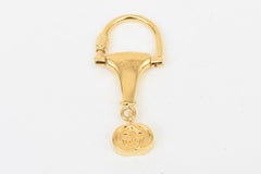 Llavero Gucci vintage con forma de bocado de caballo y chapado en oro, de los años 70