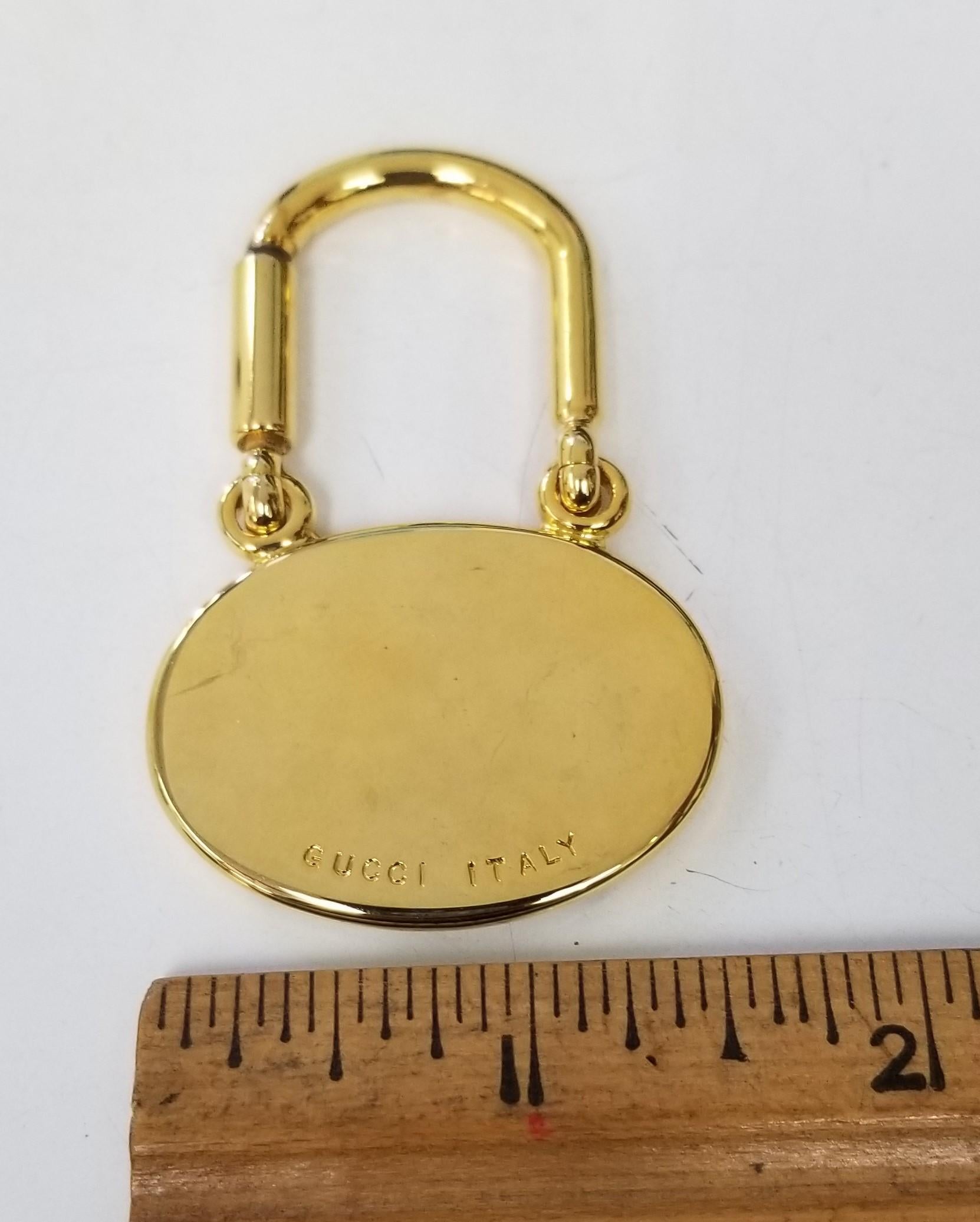 Contemporary Gucci Vintage Gold Plated Unisex Keychain For Sale