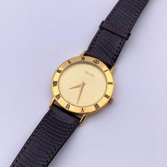 Gucci Vintage Gold Tone Stainless Steel 3000.2.M Watch Leather Strap