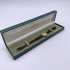 Gucci Vintage Gold Tone Stainless Steel Logo Watch Leather Strap