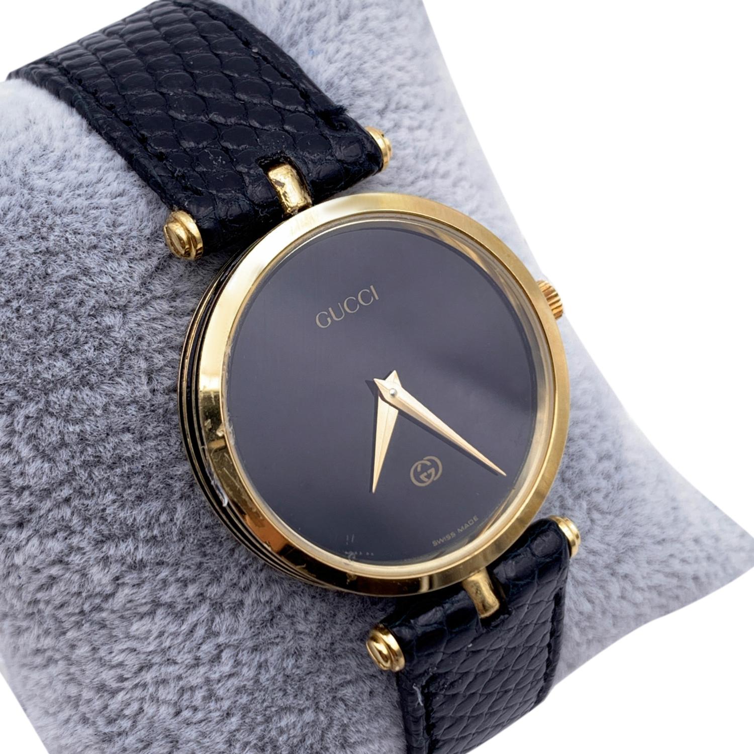 gucci gold watch black face