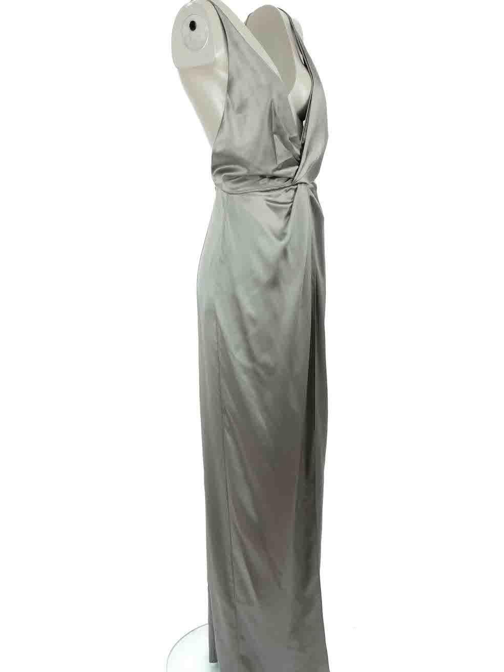 CONDITION is Very good. Hardly any visible wear to dress is evident on this used Gucci designer resale item.
 
Details
Vintage
Grey
Silk
Gown
Sleeveless
V-neck
Maxi
Leg slit opening
Back zip and hook fastening
 
Made in Italy
 
Composition
100%