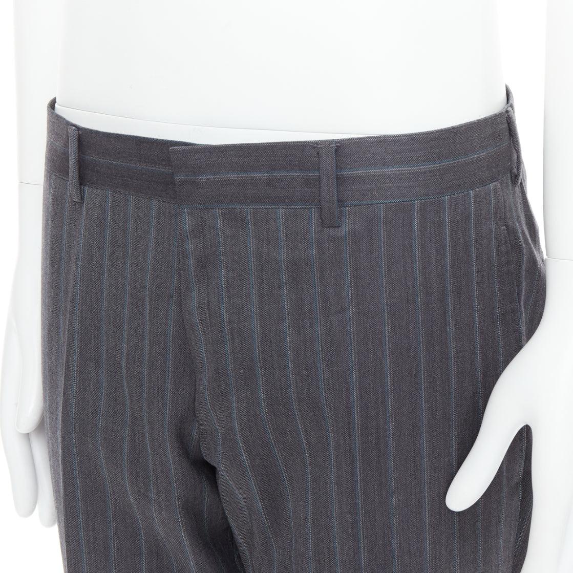 GUCCI Vintage grey wool cashmere pinstripe trouser pants IT52 XL
Reference: CNLE/A00360
Brand: Gucci
Collection: made to measure
Material: Wool, Cashmere
Color: Grey, Blue
Pattern: Pinstriped
Closure: Zip Fly
Made in: Italy

CONDITION:
Condition: