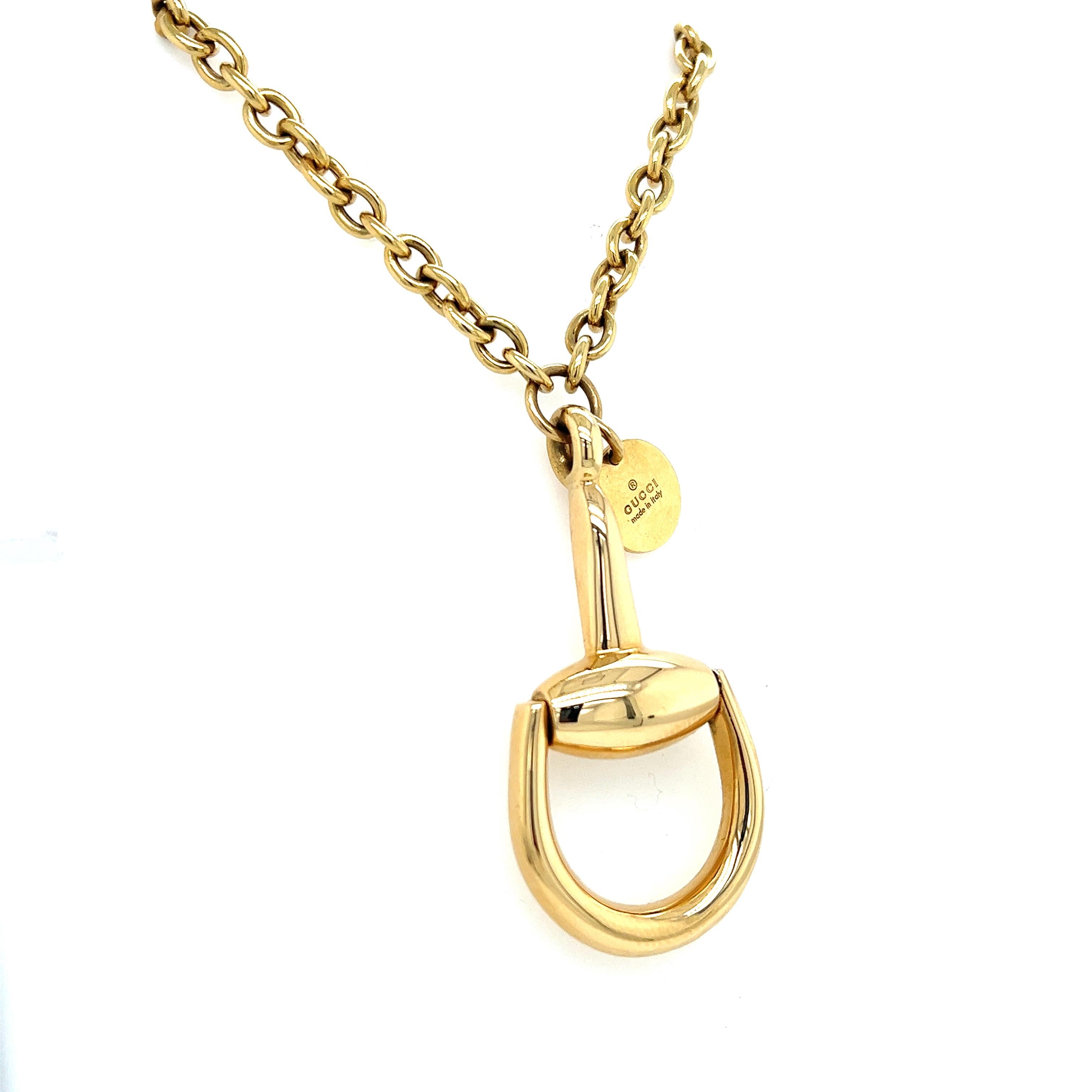 Beautiful necklace by famed designer Gucci. From the iconic Horsebit collection comes an exquisite 18K yellow gold necklace featuring a large equestrian-inspired high polished pendant that represents the luxury of Gucci's brand. 
The necklace