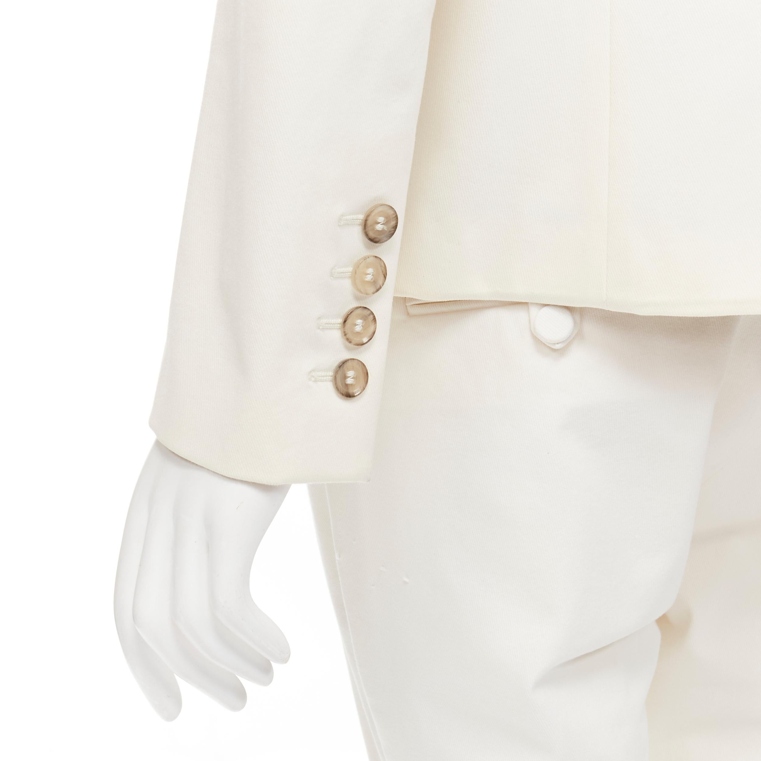 GUCCI Vintage Kris Knight floral silk lined white cotton blazer pants IT46 XL 
Reference: GIYG/A00174 
Brand: Gucci 
Material: Cotton 
Color: White 
Pattern: Solid 
Closure: Button 
Extra Detail: Peak collar blazer. Kris Knight floral print silk
