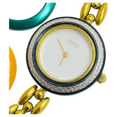 GUCCI vintage pour femmes avec lunette interchangeable et boîte de montre design avec papiers