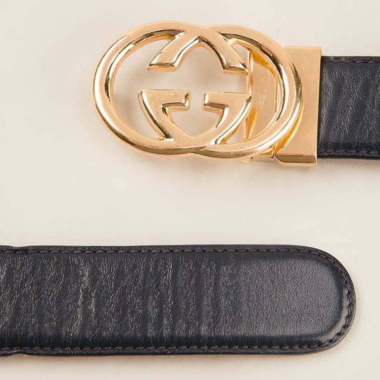 This navy blue leather belt by Gucci features a striking red interior and the iconic interlocking GG logo in gold-tone metal hardware. 

Colour: Navy Blue/ Red/ Gold

Composition: 100% Calf Leather

Measurements: Width: 2.8cm, Min Length: 72cm,