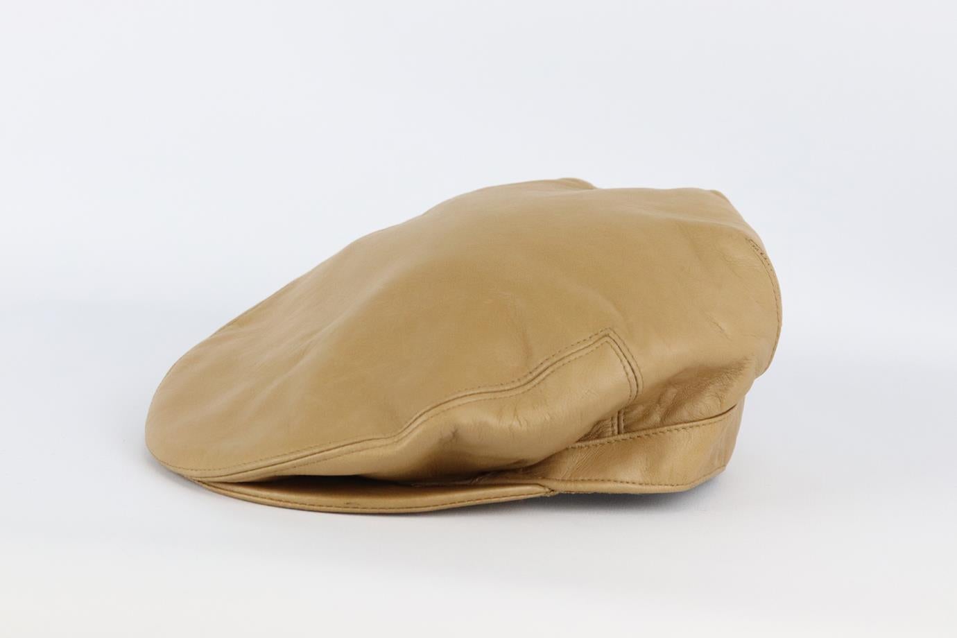 Gucci vintage leather cap. Beige. Pull on. 100% Leather; lining: 100% nylon. Does not come with dustbag or box. Size: Medium. Circumference: 23.6 in. Brim Width: 2.25 in. Good condition - Light signs of wear; see pictures.