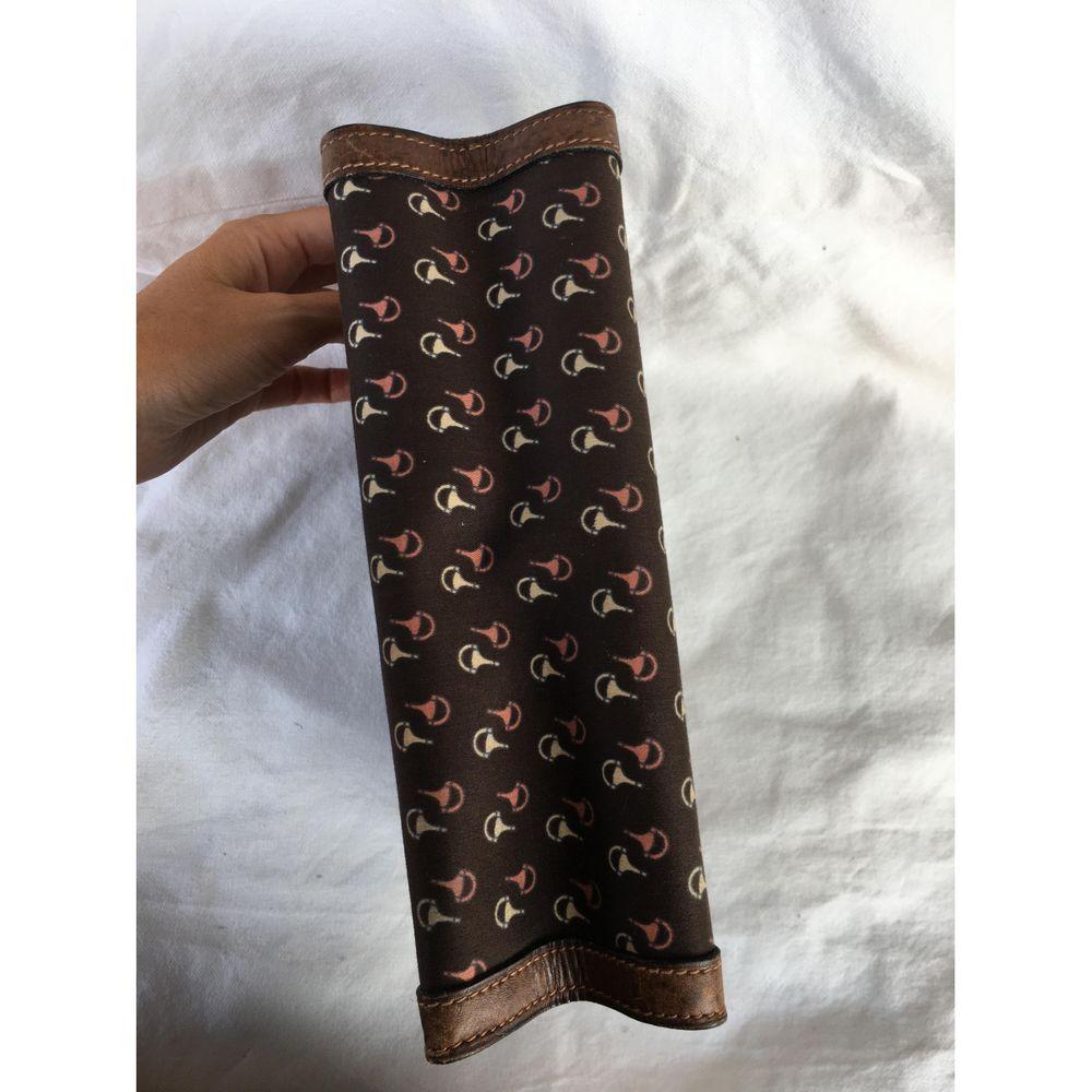 brown leather clutch bag