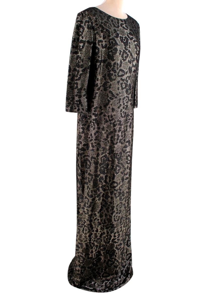Gucci Vintage Metallic Gunmetal & Black Leopard Jacquard Gown
 

 - Vintage metallic jacquard gown with an allover leopard print
 - High neck, bracelet sleeve
 - Gently fitted silhouette
 - Scoop back with concealed zip, and split hem
 - Partially