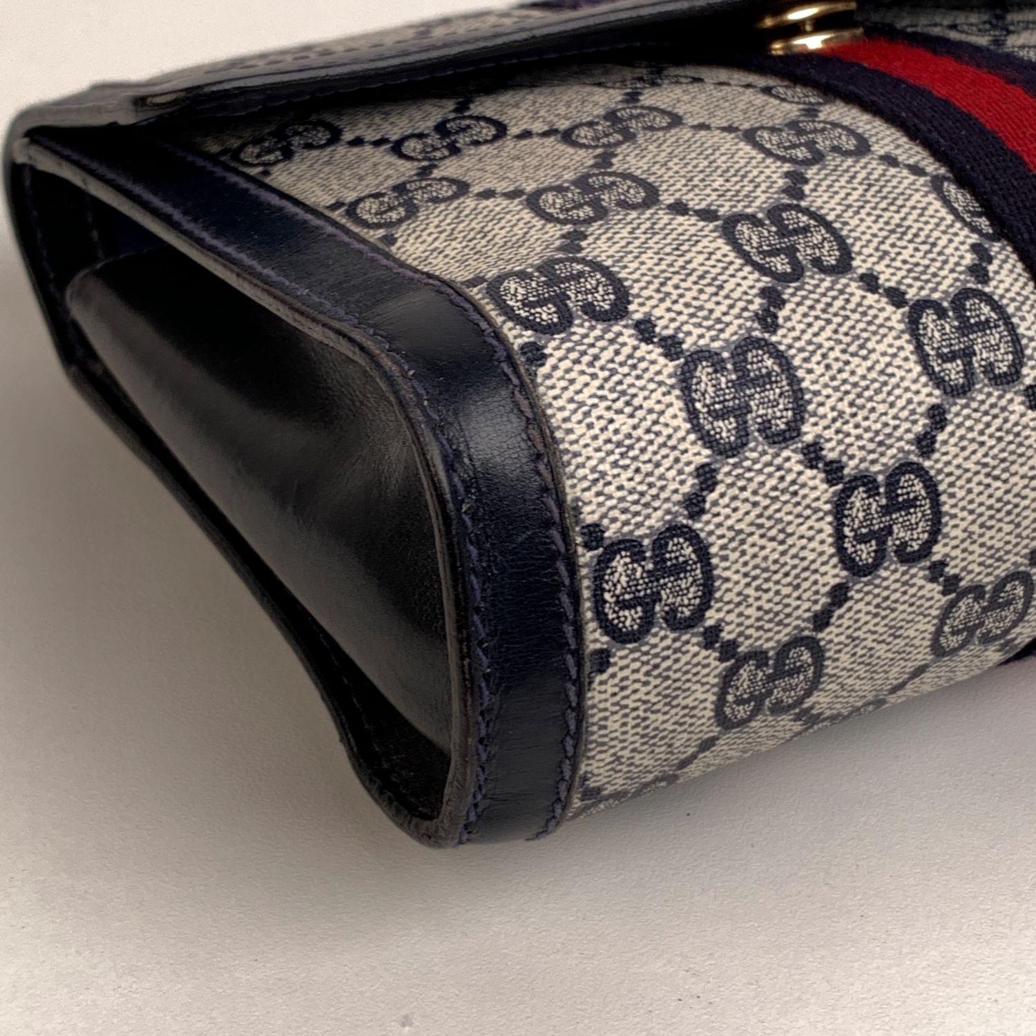 Gucci Vintage Monogram Canvas Flap Cosmetic Bag Clutch with Stripes In Excellent Condition In Rome, Rome
