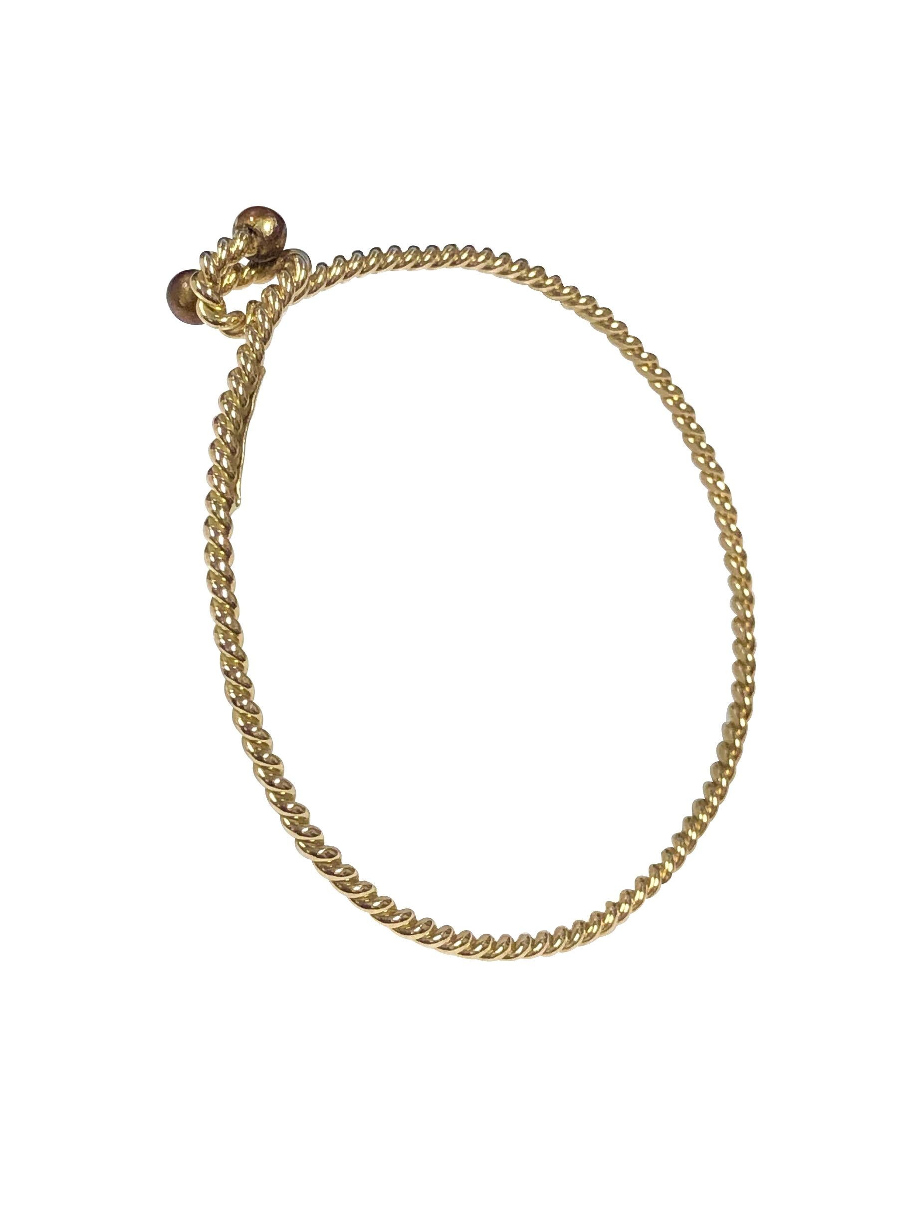 Circa 1970s Gucci 18K yellow Gold Bracelet in a Nautical Twisted Rope Design, 2 M.M. thick with an inside wrist measurement of 7 1/2 inches.